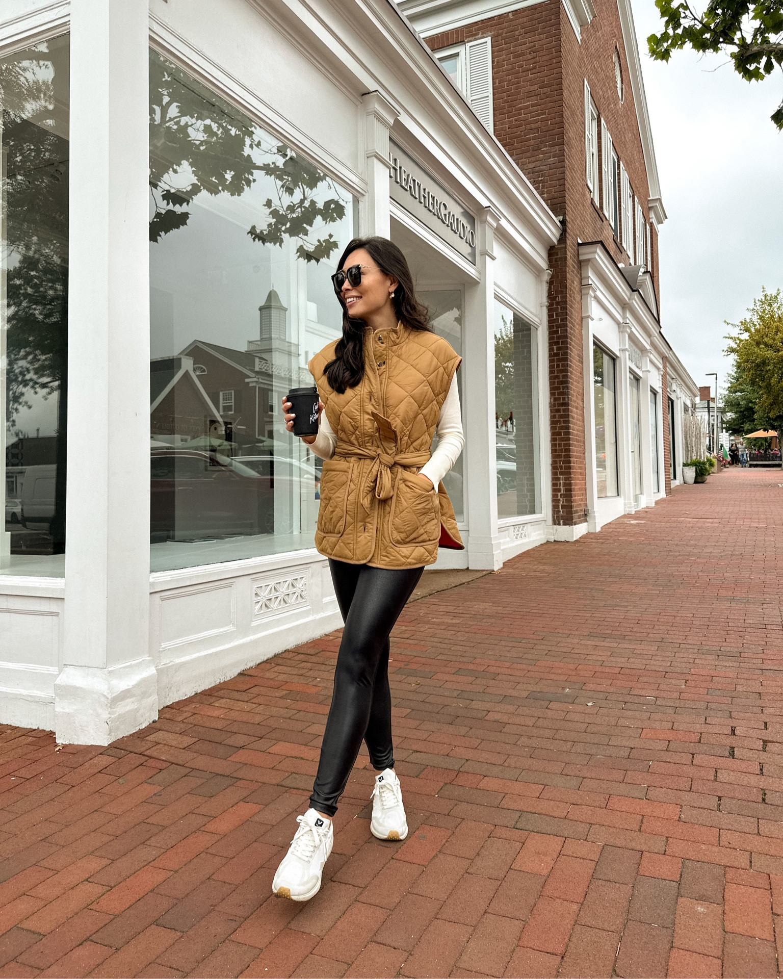 Kat Jamieson wears an easy everyday outfit for fall. Fall vest, puffer vest, leggings, casual style, sneaker outfit. #LTKunder50

#LTKSeasonal #LTKstyletip #LTKtravel