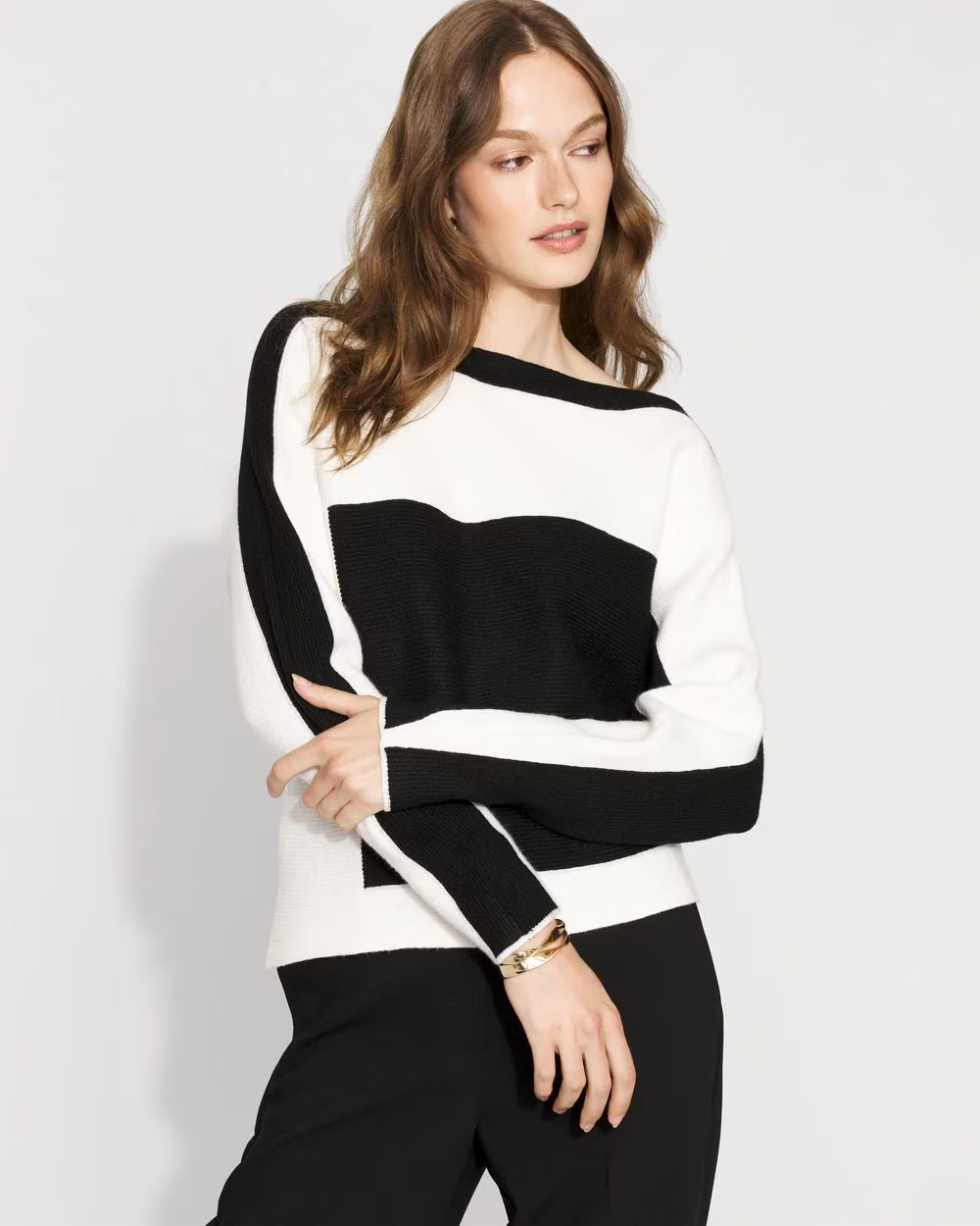 Colorblocked Asymmetric Hem Sweater50% Off. Price as Marked + Free ShippingGoing Fast!Popular! 62... | White House Black Market