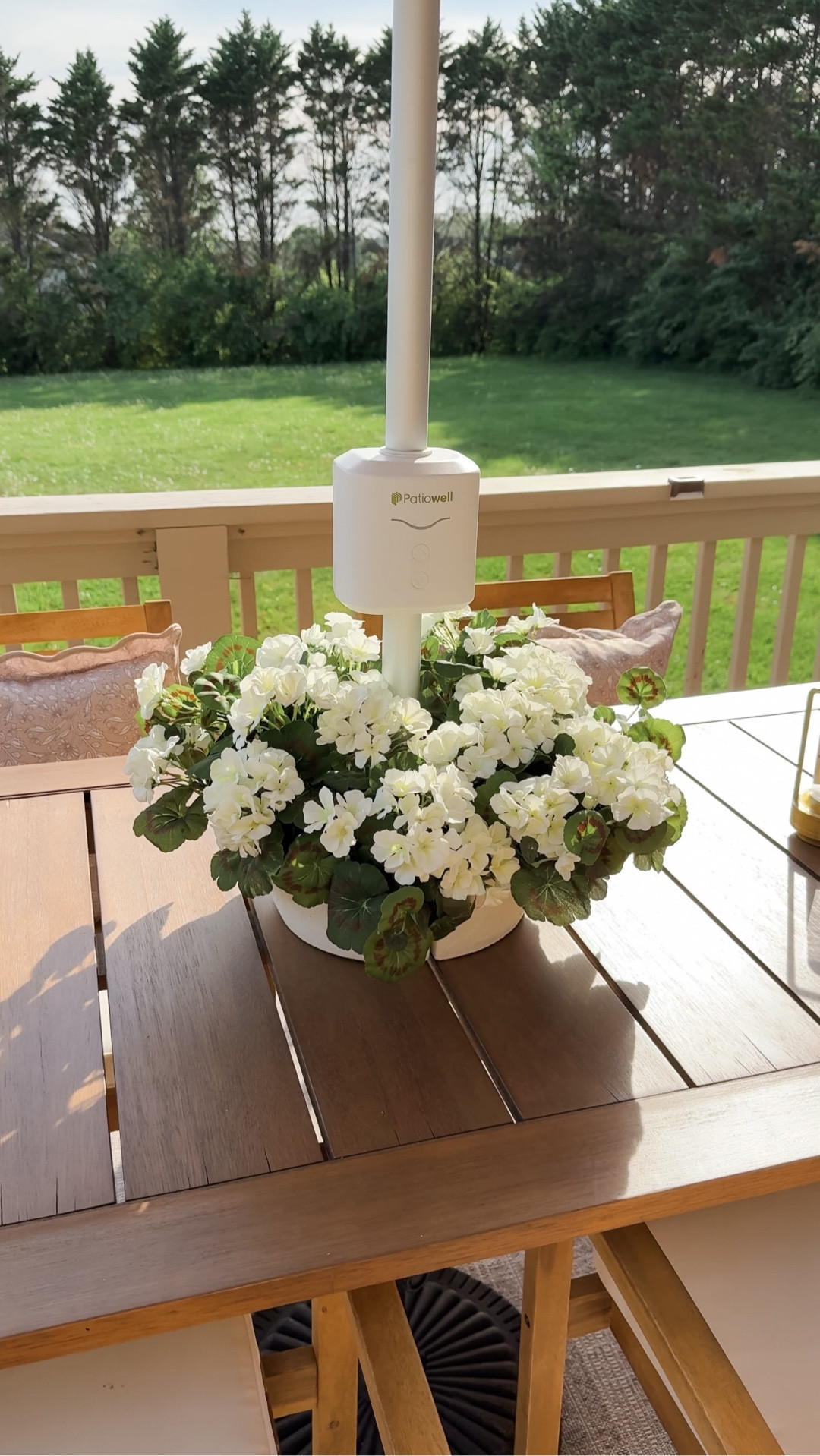 I added a gorgeous centerpiece to my outdoor dining table with this umbrella table planter! The two-piece curved design allows you to add greenery directly to the center of the table and disguise the umbrella hole. 

In order to preserve the tabletop, the planter doesn’t have drainage holes. I opted for faux geraniums that I never have to water, but you could easily plant real flowers by adding a layer of rocks and sand to the bottom of the pot. Everything is from @Wayfair 🌸 

#LTKHome #LTKSeasonal