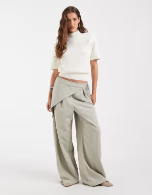 ASOS DESIGN high neck shoulder pad waisted t-shirt in cream | ASOS (Global)