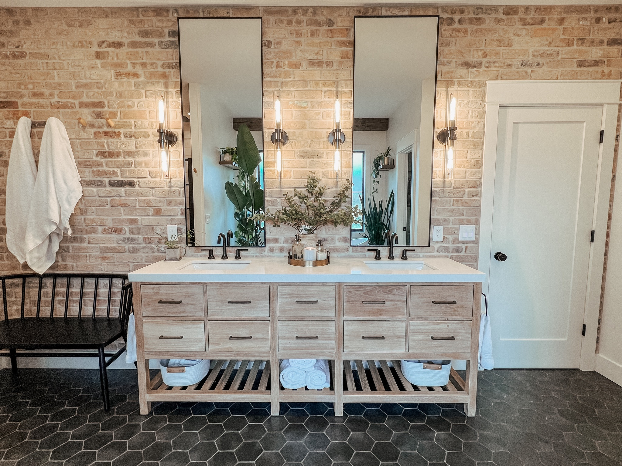 Master bath
Brick wall
Greenery
Green stems in a vase
Towels
Bathroom accessories
XL vanity
84” vanity
Soap dispensers
XL Mirrors
Bathroom bench
Reclaimed brick

#LTKHome