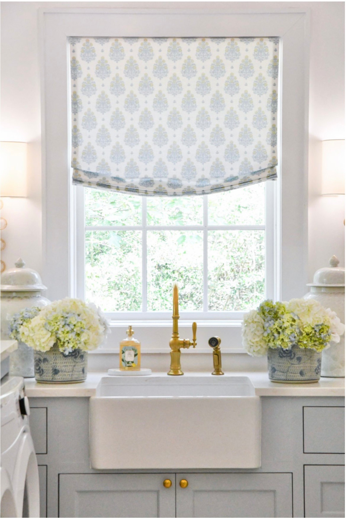 Laundry room decor
Utility room, home accessories 
Blue and white decor
Faucet, wall sconces 