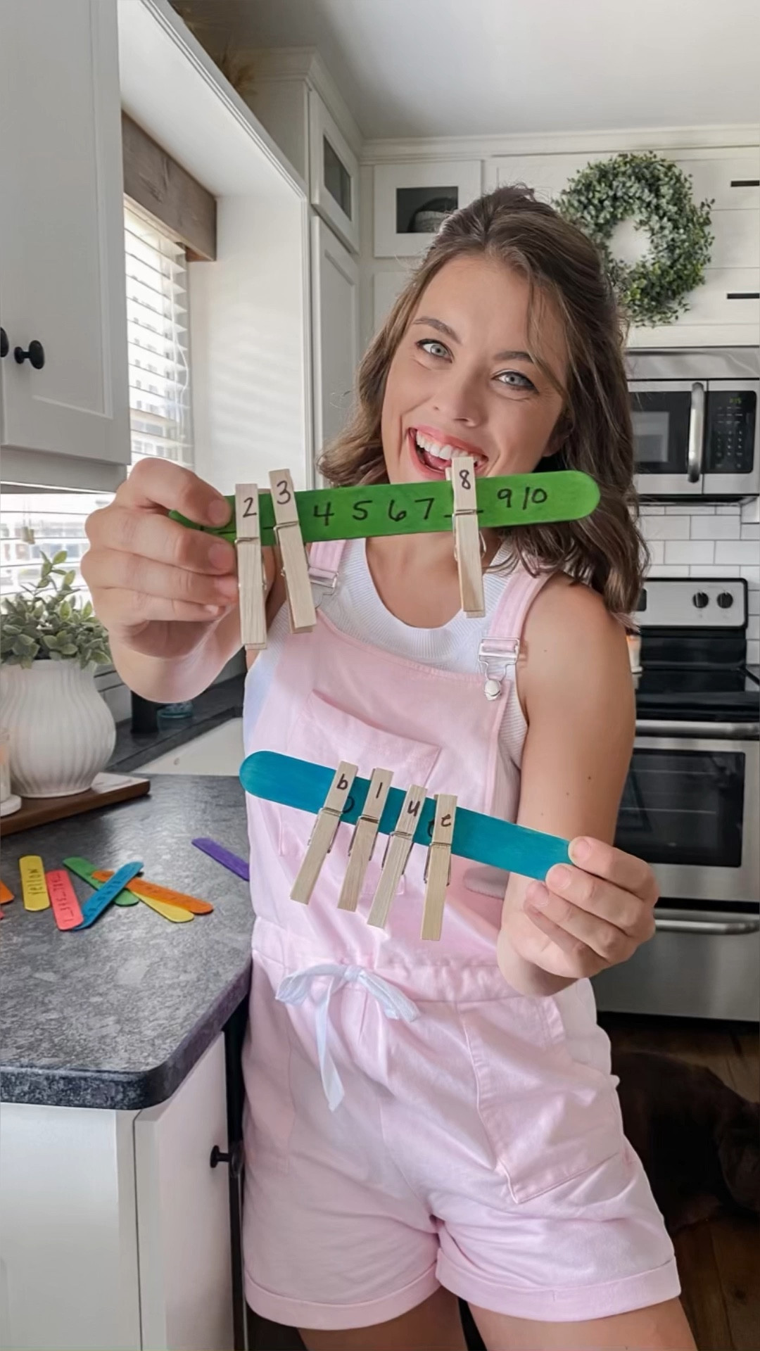 MISSING NUMBER POPSICLE STICK EXTENSION ACTIVITIES! 

So I shared the Missing Number Popsicle Stick Activity last week and one of you commented some GREAT extension ideas. I loved them so much that I had to share them with you guys! Plus, they show different ways of using the same materials, which is always a WIN WIN! 

Take your Missing Number Popsicle Sticks activity to the next level of excitement! Give your child a fun challenge by leaving multiple numbers blank on each popsicle stick. Watch as your little one's counting and problem-solving skills shine as they figure out the missing numbers, bringing a burst of confidence and accomplishment.

But that's not all! Add an extra twist by incorporating color words on the sticks and making corresponding letter clothespins for a colorful letter matching activity. It's a fantastic way to boost math skills, color recognition, and letter learning using the exact same supplies.	

Materials: super jumbo craft sticks, clothespins 

#LTKhome #LTKFind #LTKkids