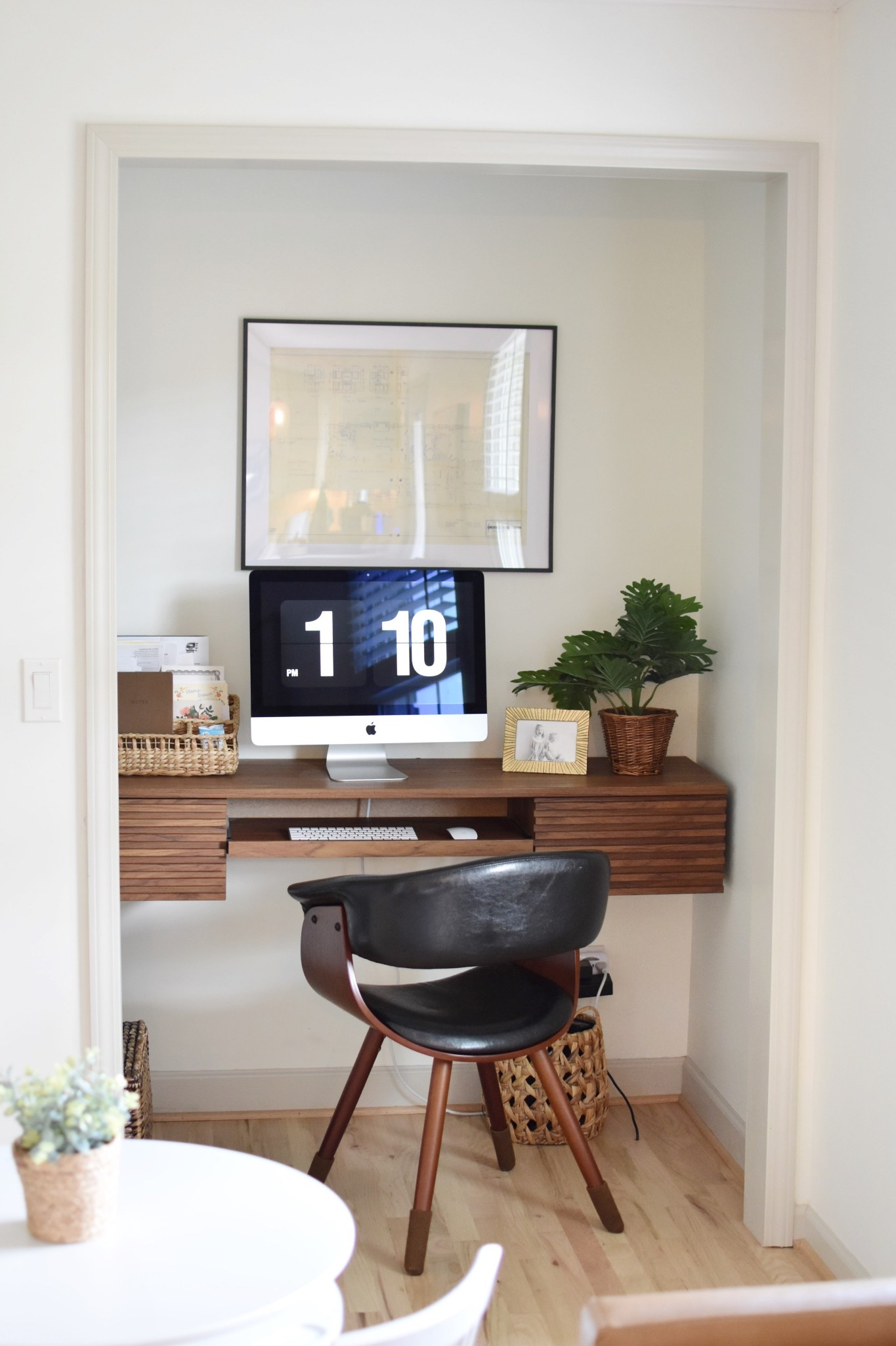 We turned a closet in our den into a tiny office and it’s just right for our family! How fun is the floating desk? And those blueprints are of the house — tucked away in a closet since 1963. 

#LTKWorkwear #LTKFamily #LTKHome