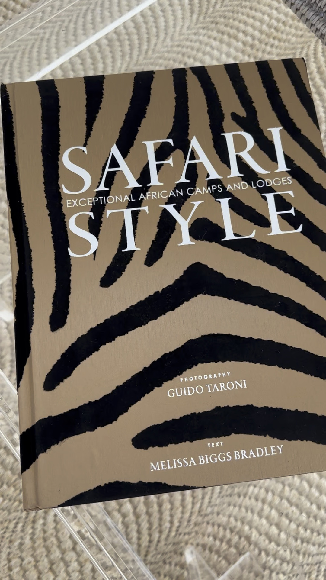 Might be my favorite coffee table book ever. The cover is stunning.  It was a subtle way to add a pop of black to my sitting room. 



Amazon home find, Ballard designs acrylic coffee table, sisal area rug living room 

#LTKhome #LTKFind #LTKunder50