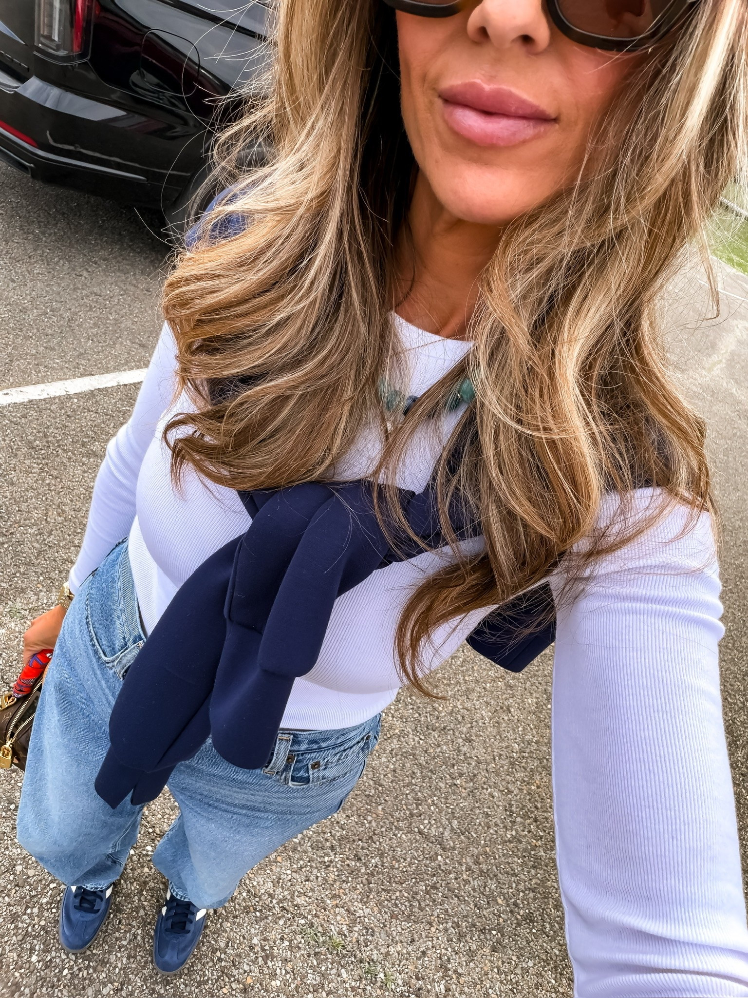This elevated casual outfit is giving effortless country club style. The lightweight sweater draped over the shoulders, classic long sleeve top, and relaxed jeans create a timeless look you’ll reach for on repeat this season.

Country club style, elevated casual outfit, sweater over shoulders, wide leg jeans, everyday style, classic fashion, casual chic, fall transition outfit, timeless wardrobe, denim outfit, effortless style, weekend outfit, themominstyle

#LTKootd #LTKSeasonal #LTKOver40