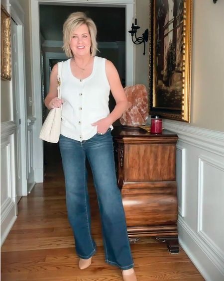 I love a great flare jean. I’ve mentioned before that they are great for making your legs look slimmer. These go a step beyond and add a nice detail of a side slit. A dark wash gives these a dressier look, but if you want a pair that’s a bit more casual, go for the light wash option instead. Don’t be afraid of flare. These aren’t ultra-wide, so I think they’re more along the line of the ever-popular bootcut. I ordered these in sizes 8 and 10. The size 8’s fit me best.

#midrisejeans #flarejeans 

#LTKfindsunder50 #LTKover40 #LTKstyletip