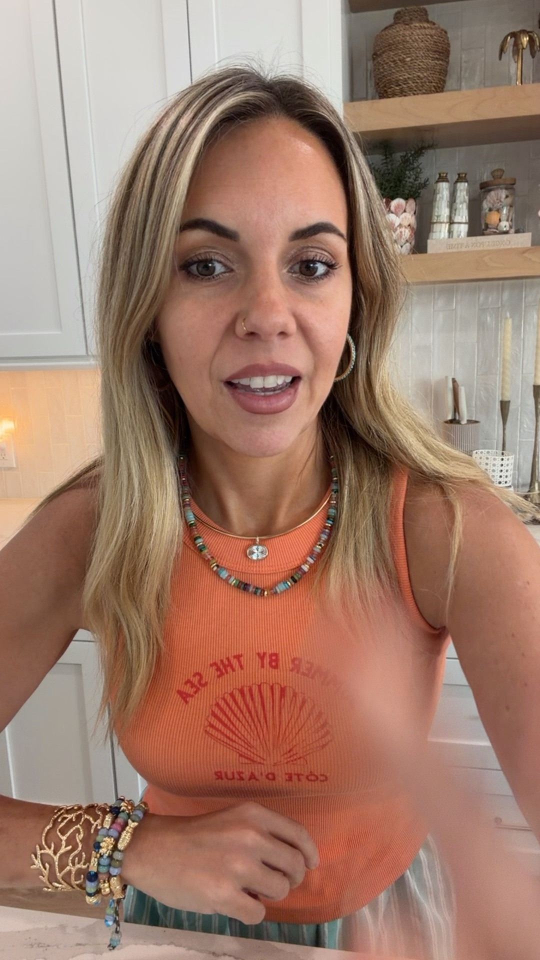 $10 bracelet deal from bubble bar is my favorite sale of the year!!! this is a great time to grab gifts for teachers or a last-minute Mother’s Day gift! Also, my seashell tank top runs small so I sized up in a medium and my striped shorts are true to size.