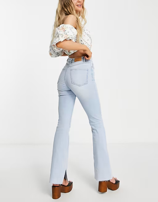 Stradivarius stretch flare jean with split detail in light blue | ASOS (Global)
