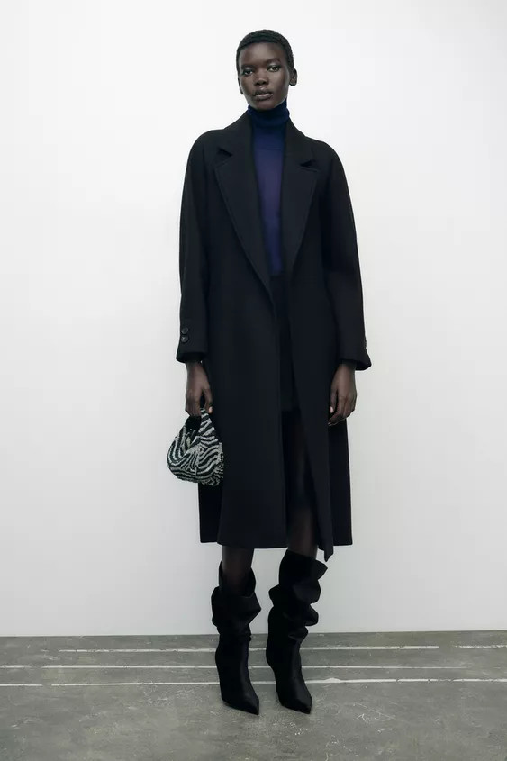 Coat made of a wool blend. Lapel collar. Long sleeves. Front welt pockets. Back opening. Self be... | Zara US