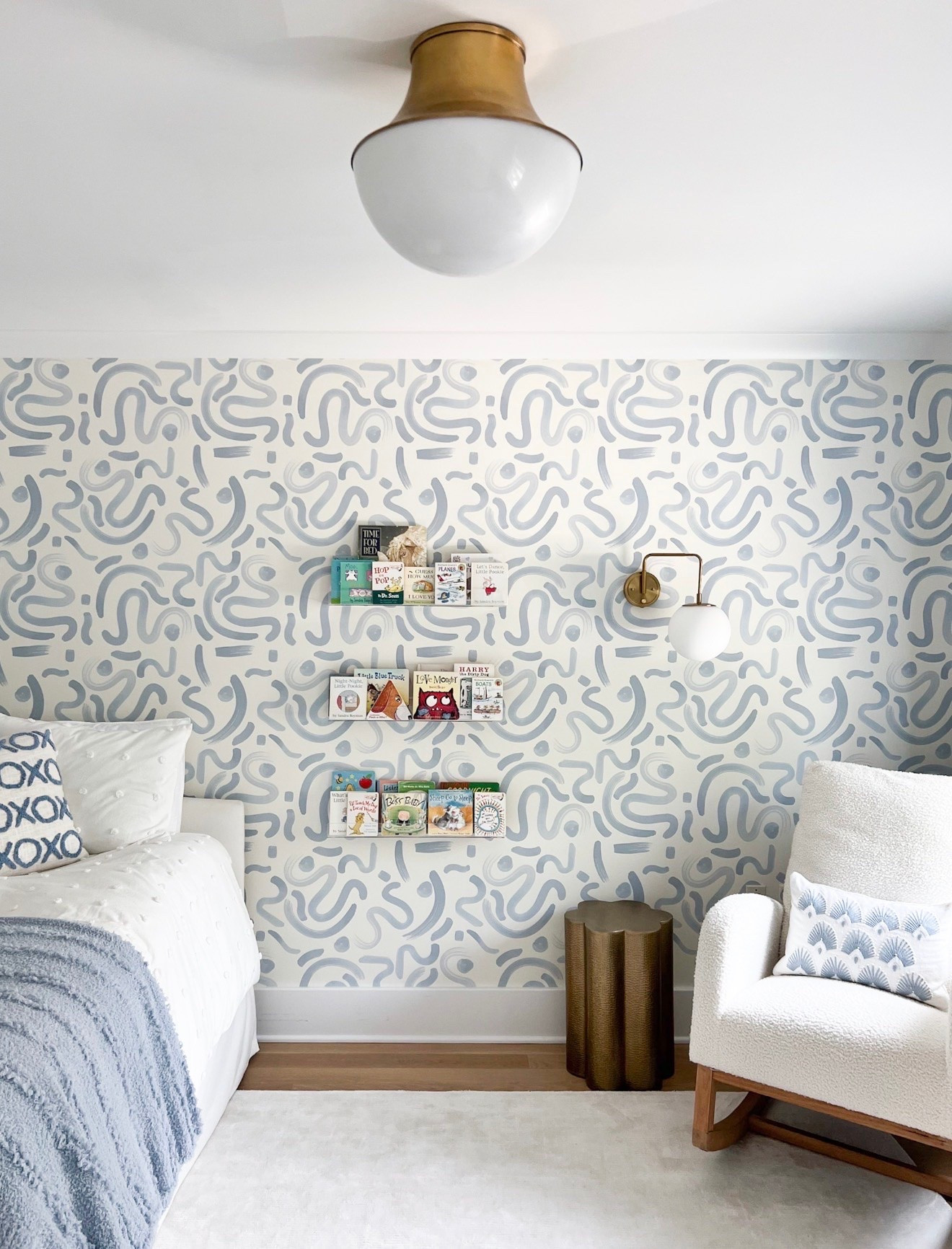 Lighting is one of my favorite ways to add personality to a space, and this room is a perfect example. The brass and white flush mount pairs beautifully with the matching wall sconce, creating a cohesive look that feels both playful and timeless. Thoughtful lighting can completely elevate a room, especially when it complements the other design details so effortlessly.

kids room decor, statement lighting, flush mount lighting, brass lighting, wall sconce, bedroom design, home decor, interior design, lighting inspiration, kids bedroom, girlonthehudson

#LTKHome #LTKSeasonal