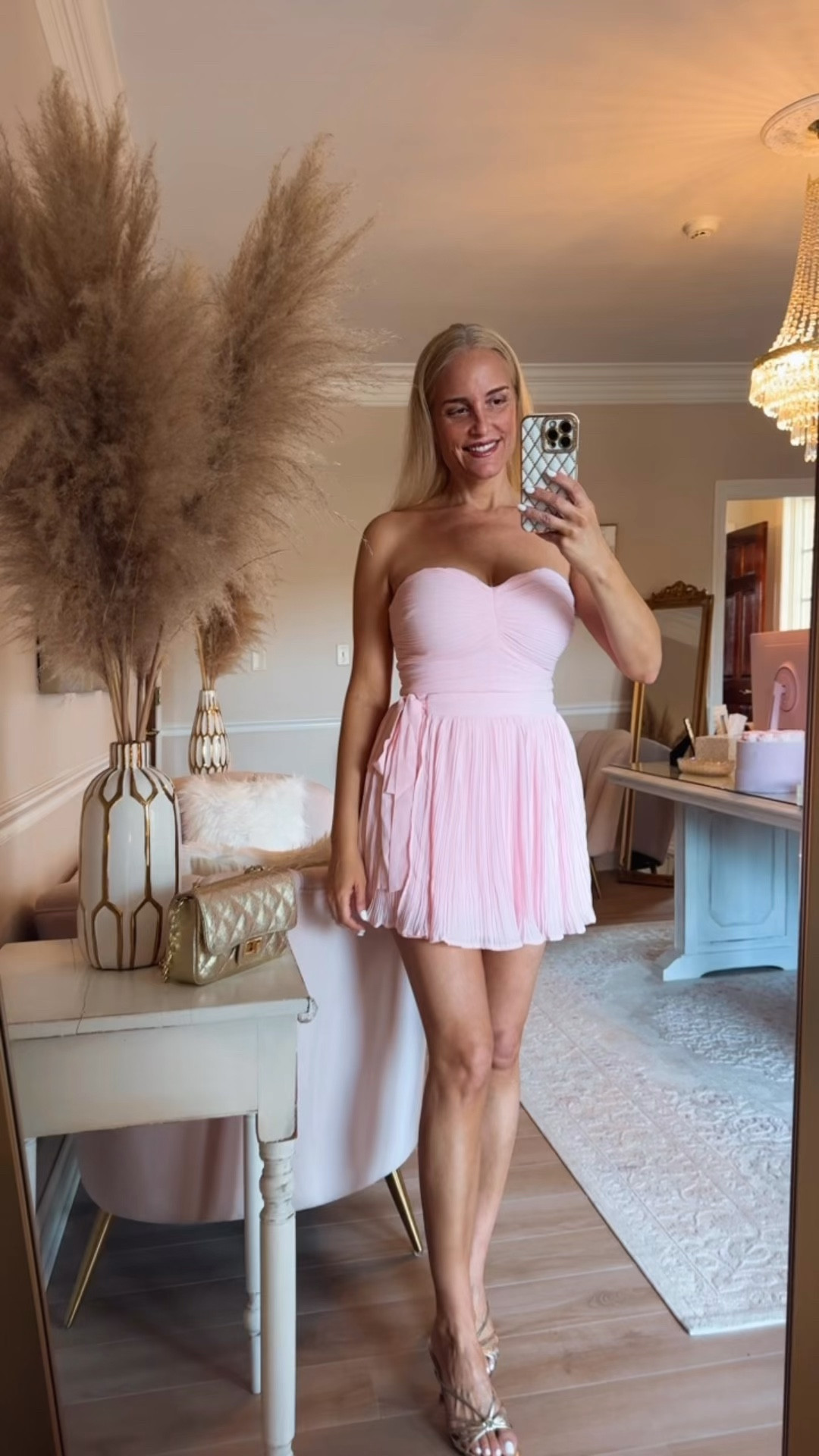 Omg this dress is sooo cute!! it looks very chic and high end. Also has built in shorts underneath. I am loving these gold strappy sandals and my new gold quilted bag too.  ￼

#LTKSeasonal #LTKootd #LTKdayinmylife