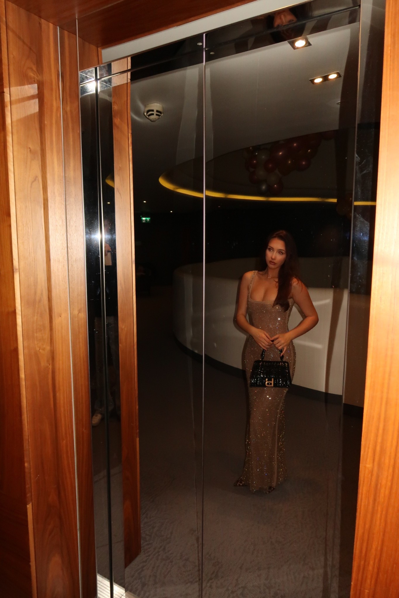 The gold maxi dress I have a size XS 