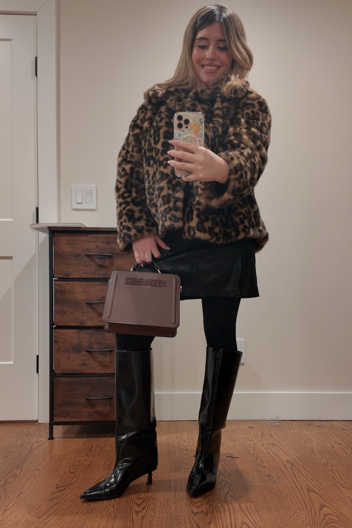 Cute winter outfit! Jacket from Abercrombie, skirt from Amazon, Leggings from Target, Bag by Steve Madden, Boots from Zara!