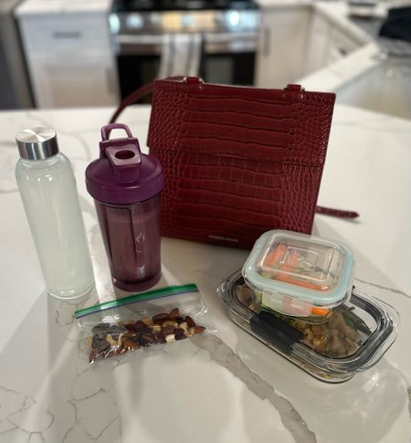 My in the office essentials! Chic bag to carry your lunch, glass water bottle, bottle blender for a protein shake, vitamin & supplement holder, and glass containers for meal prep. Easy for any travel day too! Exact products tagged plus a few extra options I love from Modern Picnic  

🏷️ Adult lunch box, workwear, essential, meal prep essentials, healthy lifestyle on the go 

#LTKfitness #LTKworkwear #LTKSeasonal