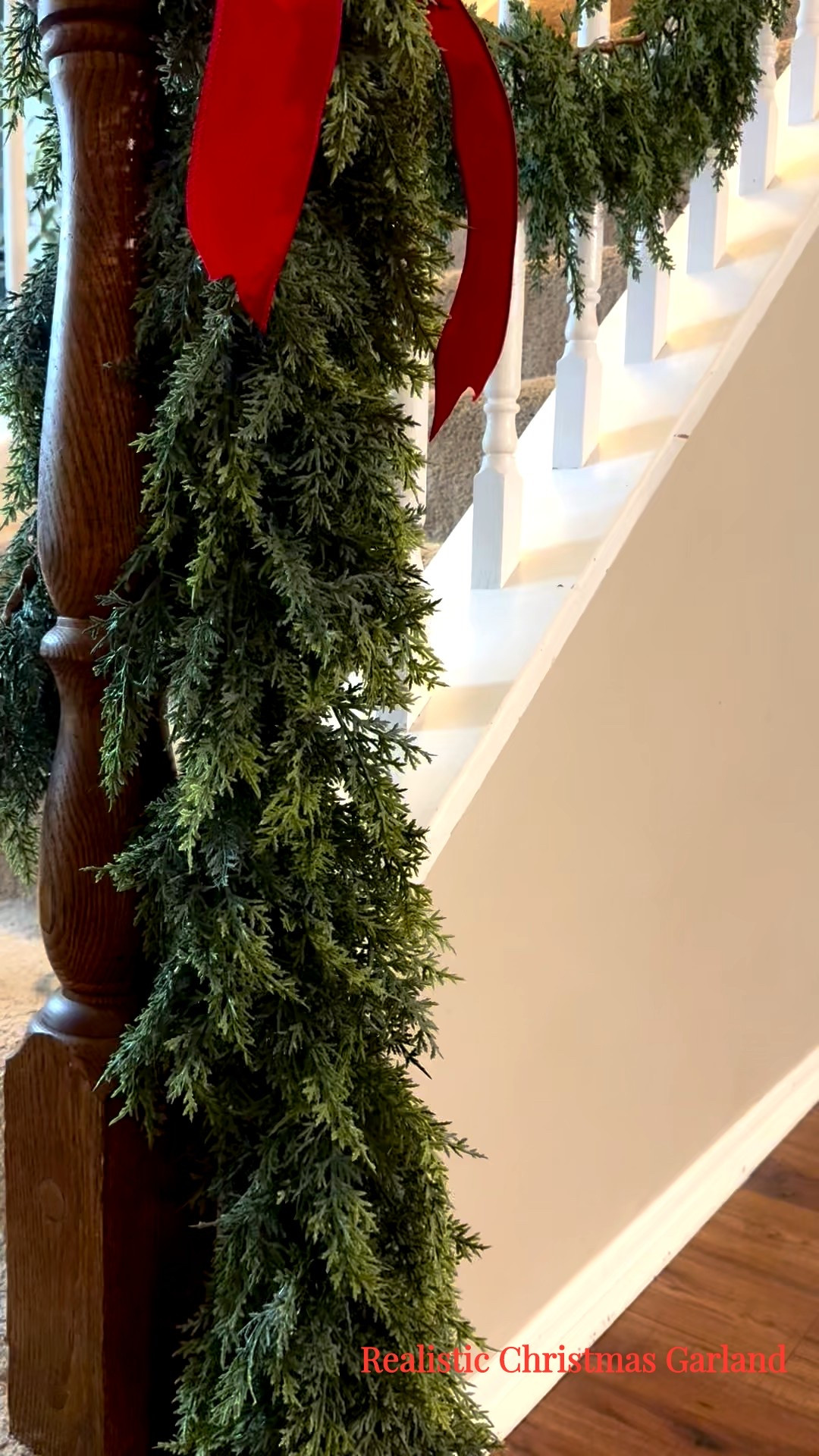 Our staircase is officially ready for Christmas 
I used this super full, realistic garland and paired it with classic red velvet bows to give the whole entryway that timeless holiday look. It drapes beautifully, is easy to shape, and instantly makes the space feel warm and festive.

Linking the exact garland and bows I used so you can recreate the look in your home 🎄
#HolidayHome #ChristmasDecor #GarlandDecor #LTKHoliday #LTKHome #CozyChristmas #StaircaseDecor #HolidayEntryway #ChristmasHomeDecor #LTKSeasonal
