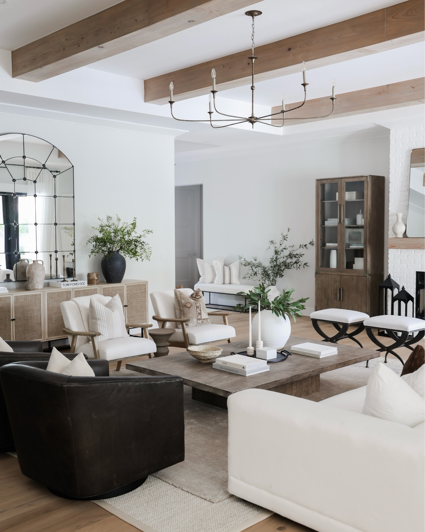 Modern organic living room! Home decor! 
Coffee table, accent chairs, console, cabinet, chandelier, ottomans, bench, pillows, mirror, rug