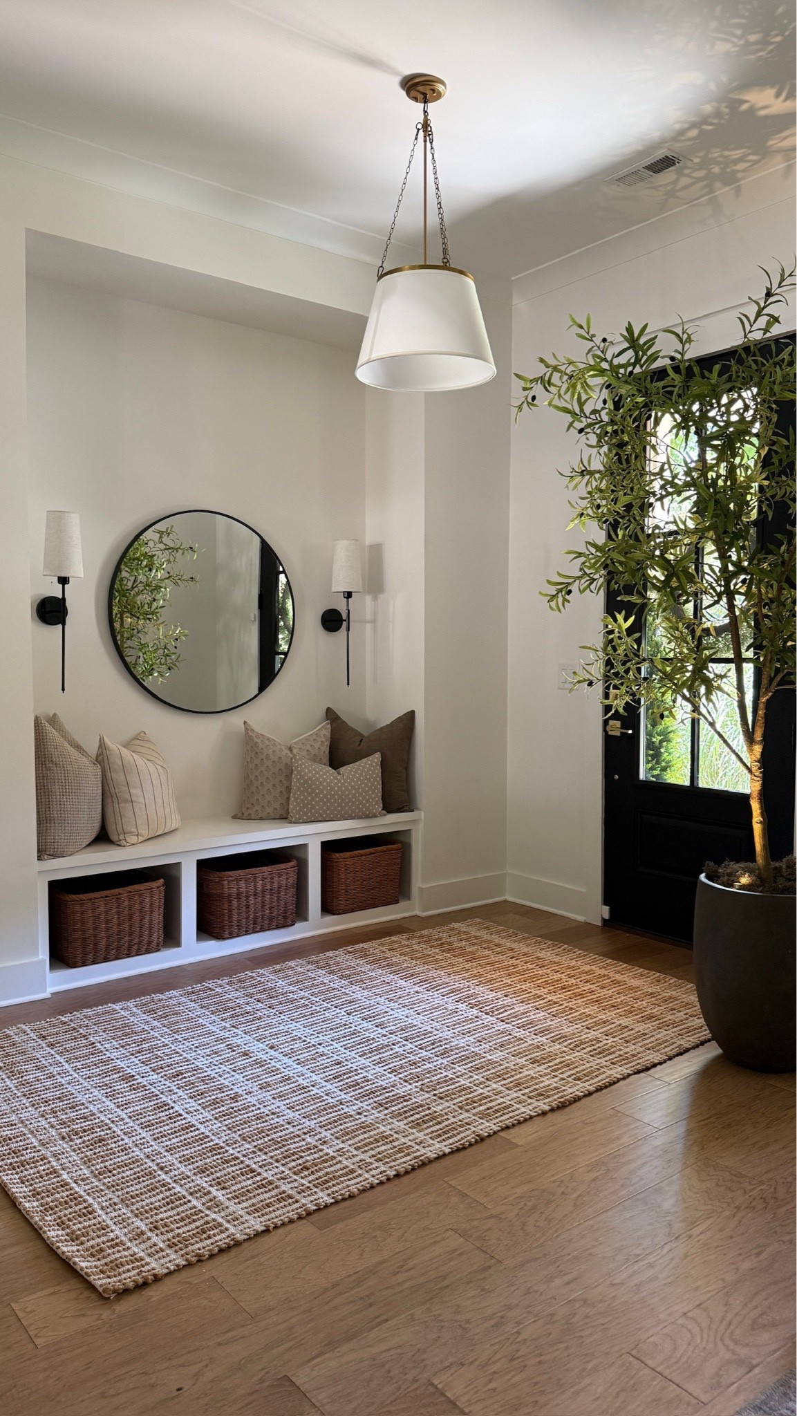 It’s hard to pick favorites, but lately I’ve found that my absolute favorite part of our entryway is our faux tree and planter ✨ It brings such a fresh vibe to this cozy, modern space.

#LTKHome