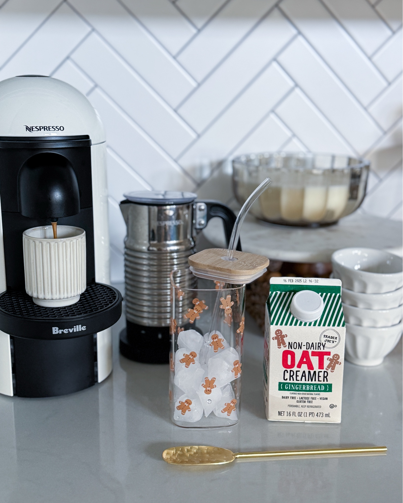 Gingerbread Iced Lattes with Gingerbread Cold Foam in the cutest glass cups. (Gingerbread Oat Milk Creamer is from Trader Joe’s)  

Nespresso - Christmas Glasses - Milk Frother - Coffee Station 

#LTKGiftGuide #LTKHome #LTKCyberWeek