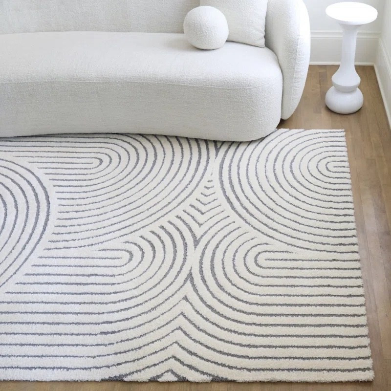 This Barklay indoor outdoor rug by Wade Logan is such a versatile find for both your living room and patio. The neutral cream base with subtle geometric lines adds just enough pattern while still keeping the space calm and modern. Styled with a curved sofa and minimal decor for a clean, elevated look. Plus, it’s currently on sale, making it an easy update for any space

#LTKHome #LTKSaleAlert