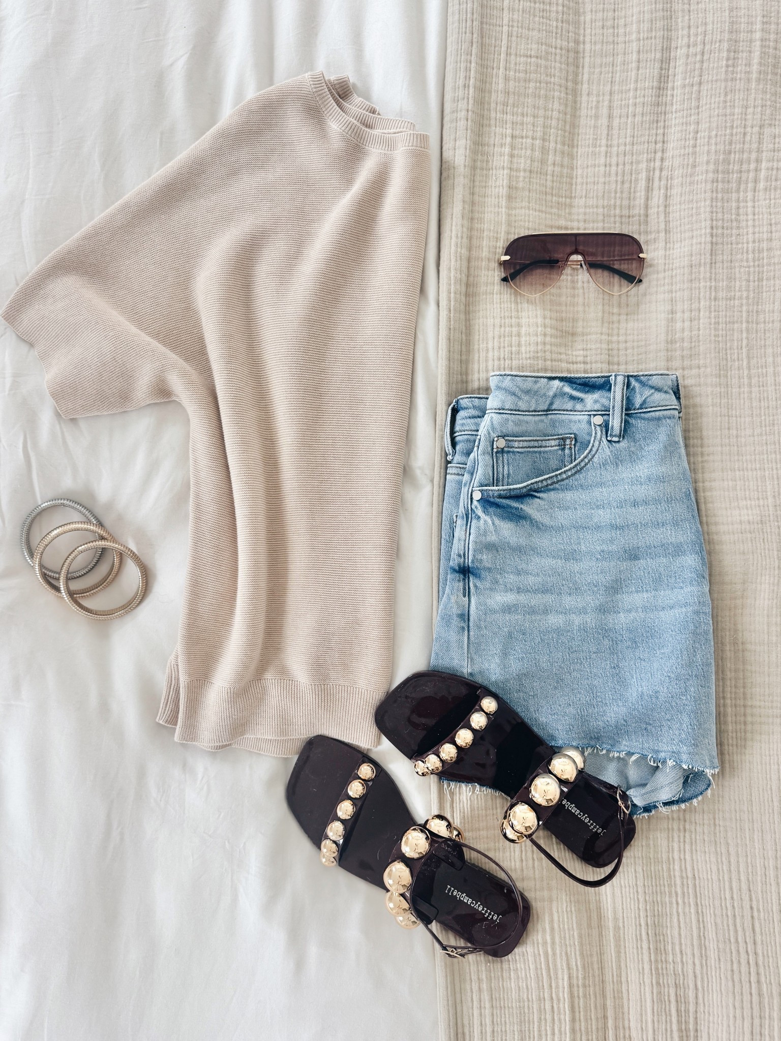 Vacation outfit!  This is one of my favorite tops to dress up or down.  I have small and size 28 in the organic cotton denim shorts.  Jelly sandals true to size.  

#LTKOver40 #LTKTravel #LTKTall