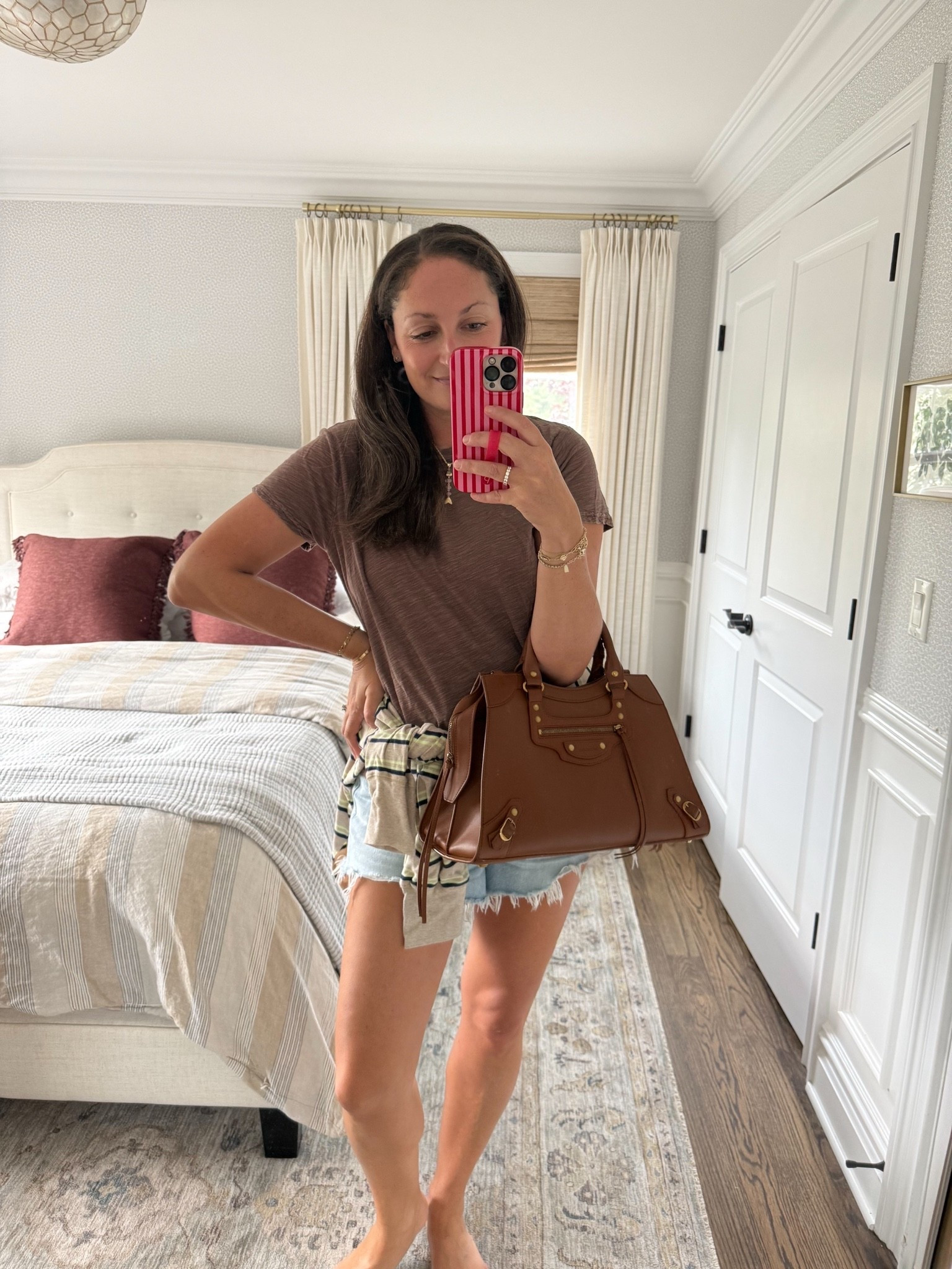 Fall transitional OOTD! these jean shorts on repeat + my favorite sweater and a cute striped long sleeve tee tied around the waist! Statement necklace that was an anniversary gift. 

My bag is borrowed from @Vivrelle and you can use my code MICHELLEPULMAN for a free month!

#LTKmomlife #LTKootd #LTKSeasonal