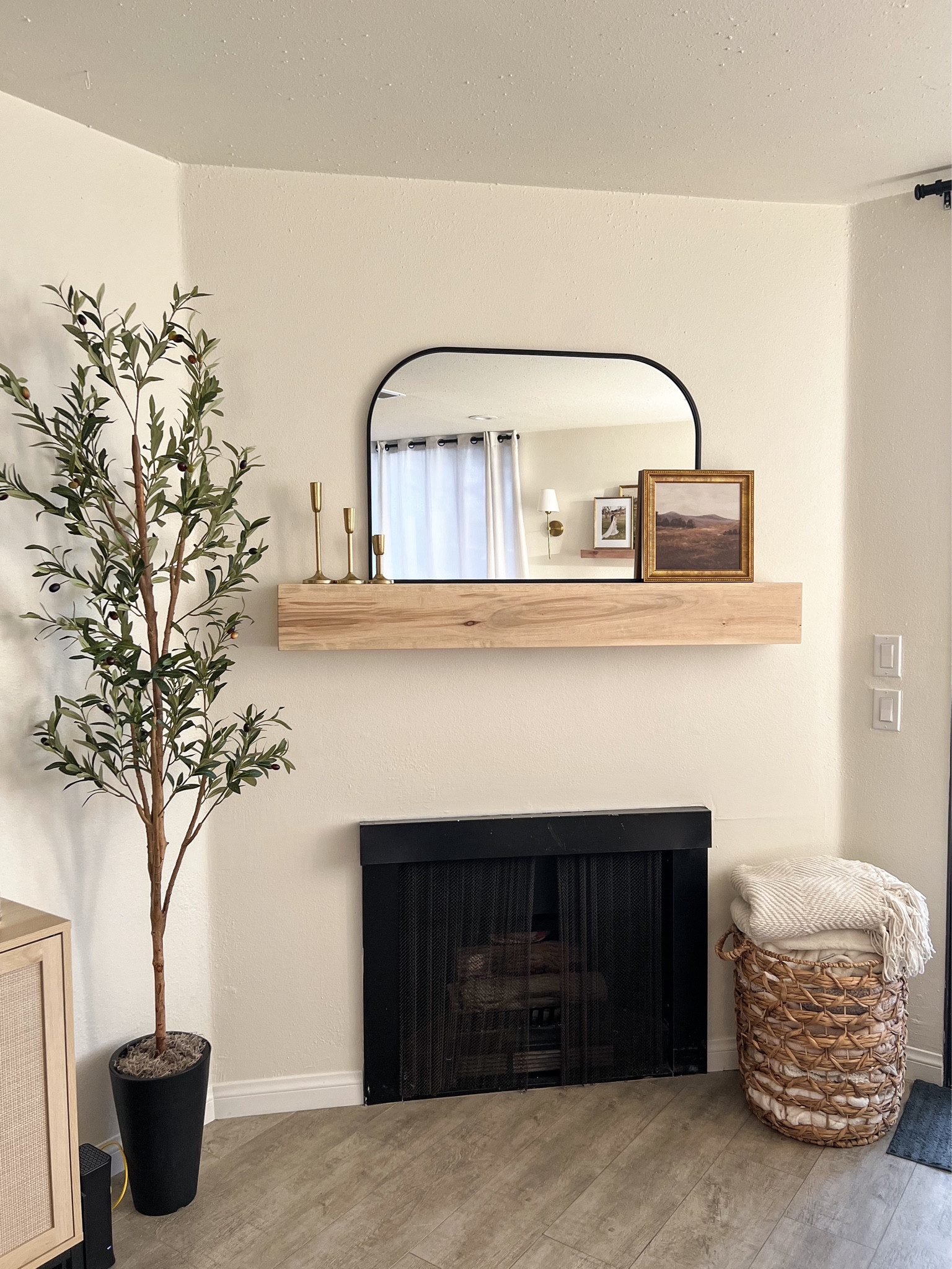 Fireplace wood mantel, organic modern decor, wood stain, olive tree, mantel mirror

#LTKHome