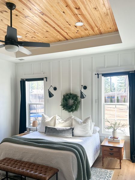 Master bedroom, modern farmhouse bedroom, white bedroom, pure white, board and batten, pine ceiling, white bedding, euro pillows, green knit blanket, Casaluna bedding, wall sconces, swing arm wall sconces, black curtains, velvet curtains, bedroom inspo, bedroom inspiration, master bedroom decor, natural night stands, end tables, bedroom furniture, 

#LTKSeasonal #LTKhome