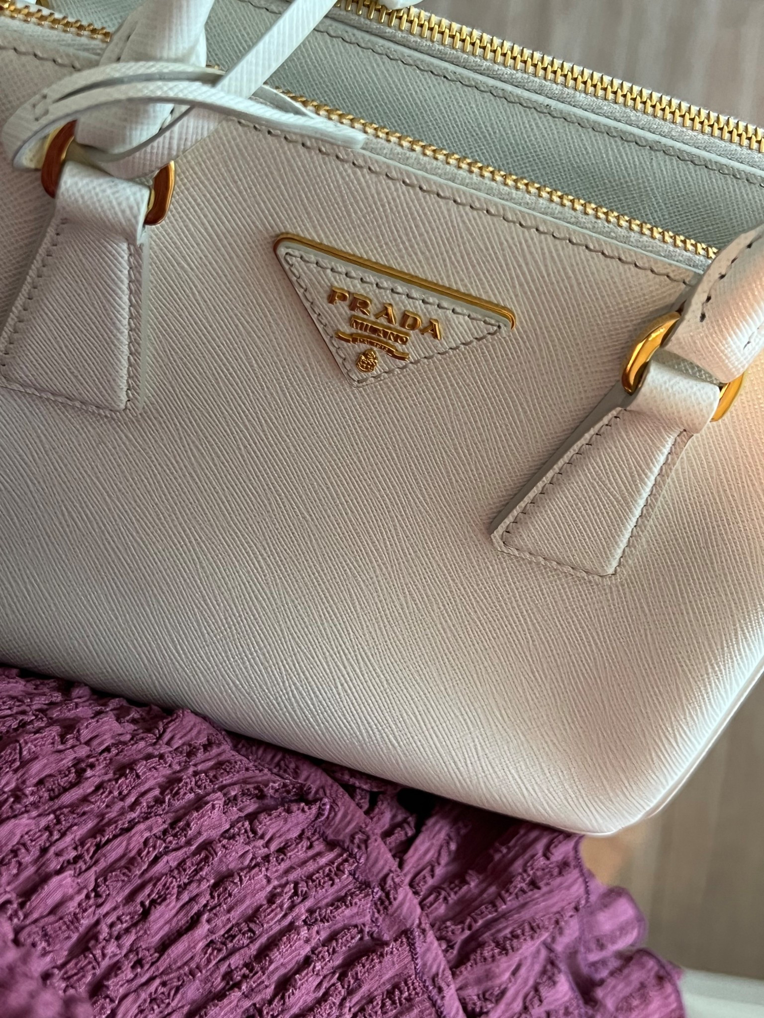 A girls best friend = Prada handbags 