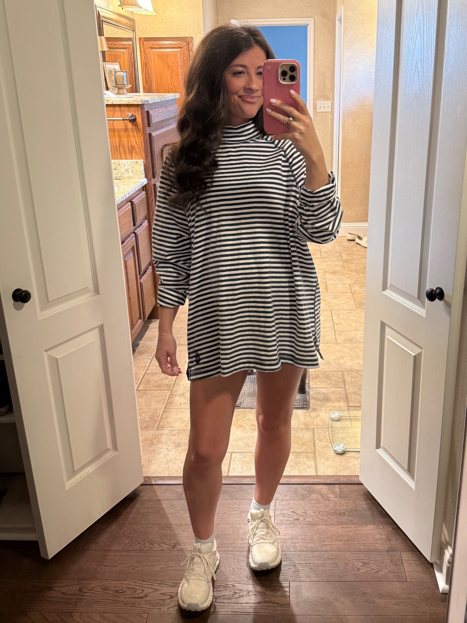 Loving this FP long sleeve mock neck top! The oversized fit is perfect for a growing bump 🤍 a great piece to layer over in the winter months! 

#LTKStyleTip #LTKBump