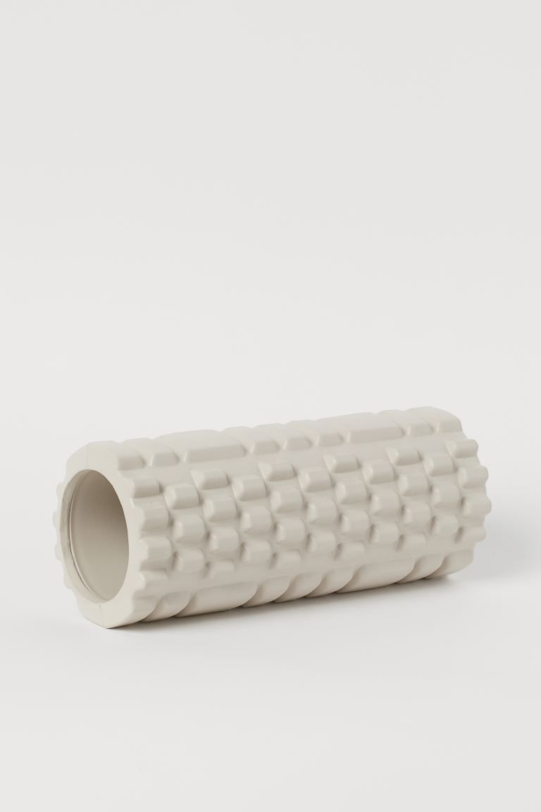 Foam roller with a textured surface. Use for warming up, stretching, and effective massage of sor... | H&M (US + CA)