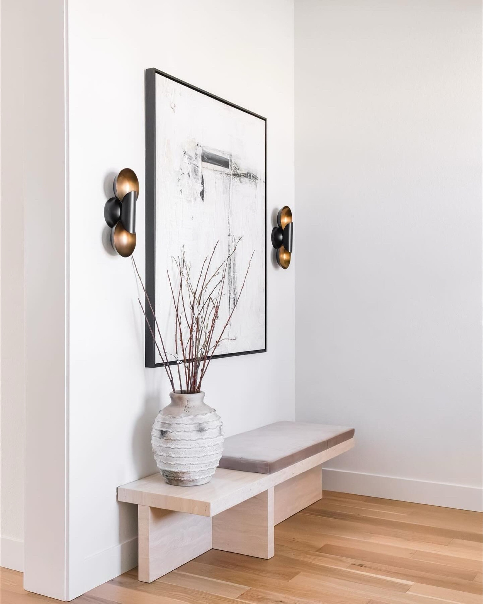 Entry way details in our home!

Home decor 
Sconce lights 
Travertine 
Stone 
Bench 

#LTKHome #LTKFamily