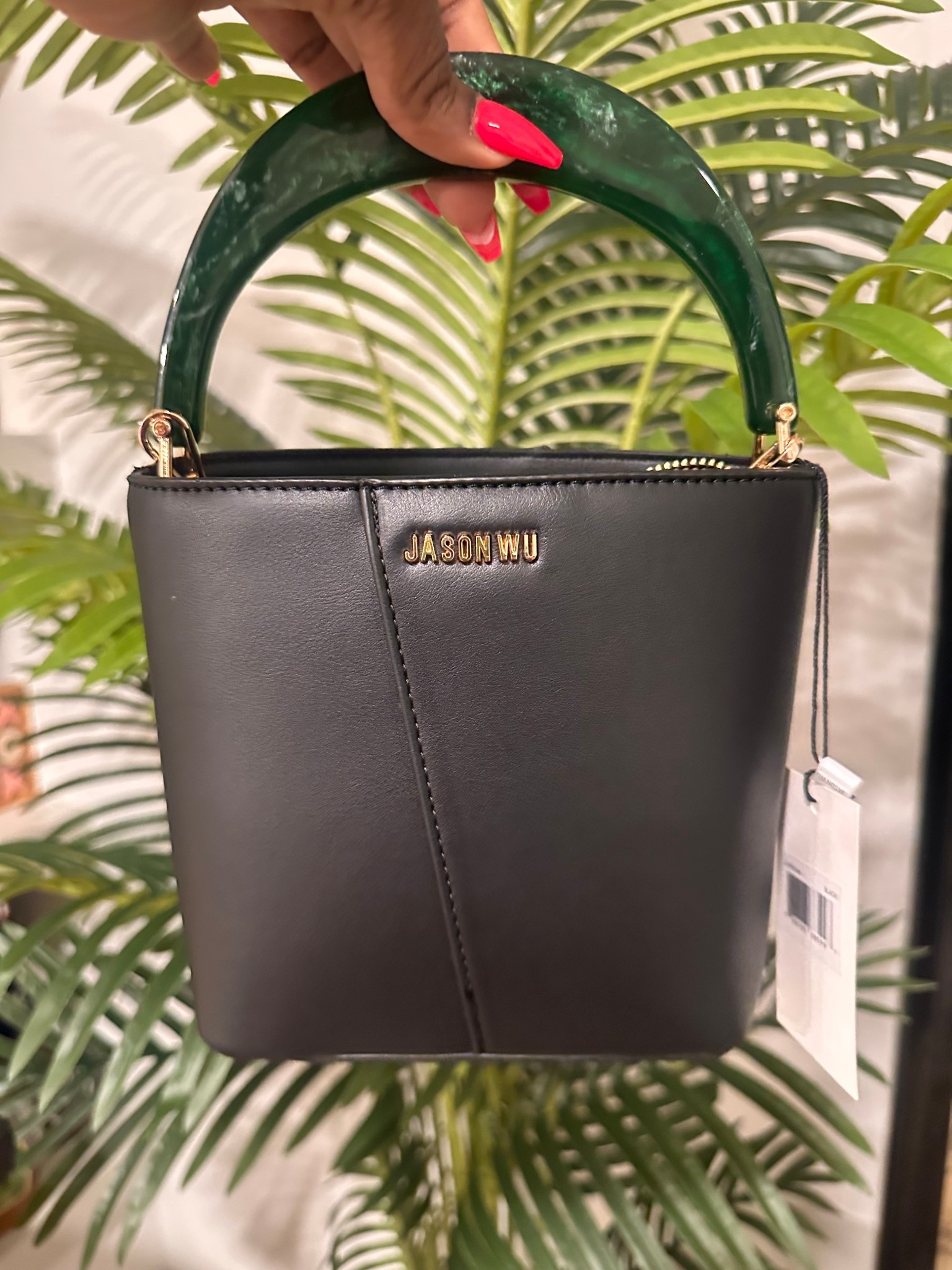 This bag?? She’s classy with a little edge 🖤
The green handle just does something for me 😍

#LTKgrwm