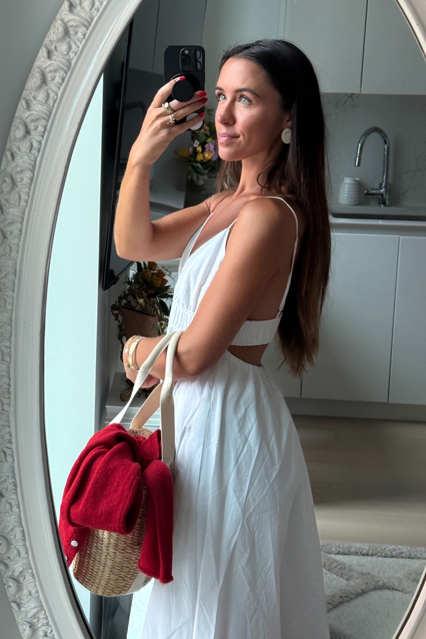 Perfect white summer maxi dress that you can dress up or wear for a casual outfit. Wearing a S for a looser fit but I also have it in XS in other colors. Paired it with red kitten sandals, a red cardigan, and a straw bag.