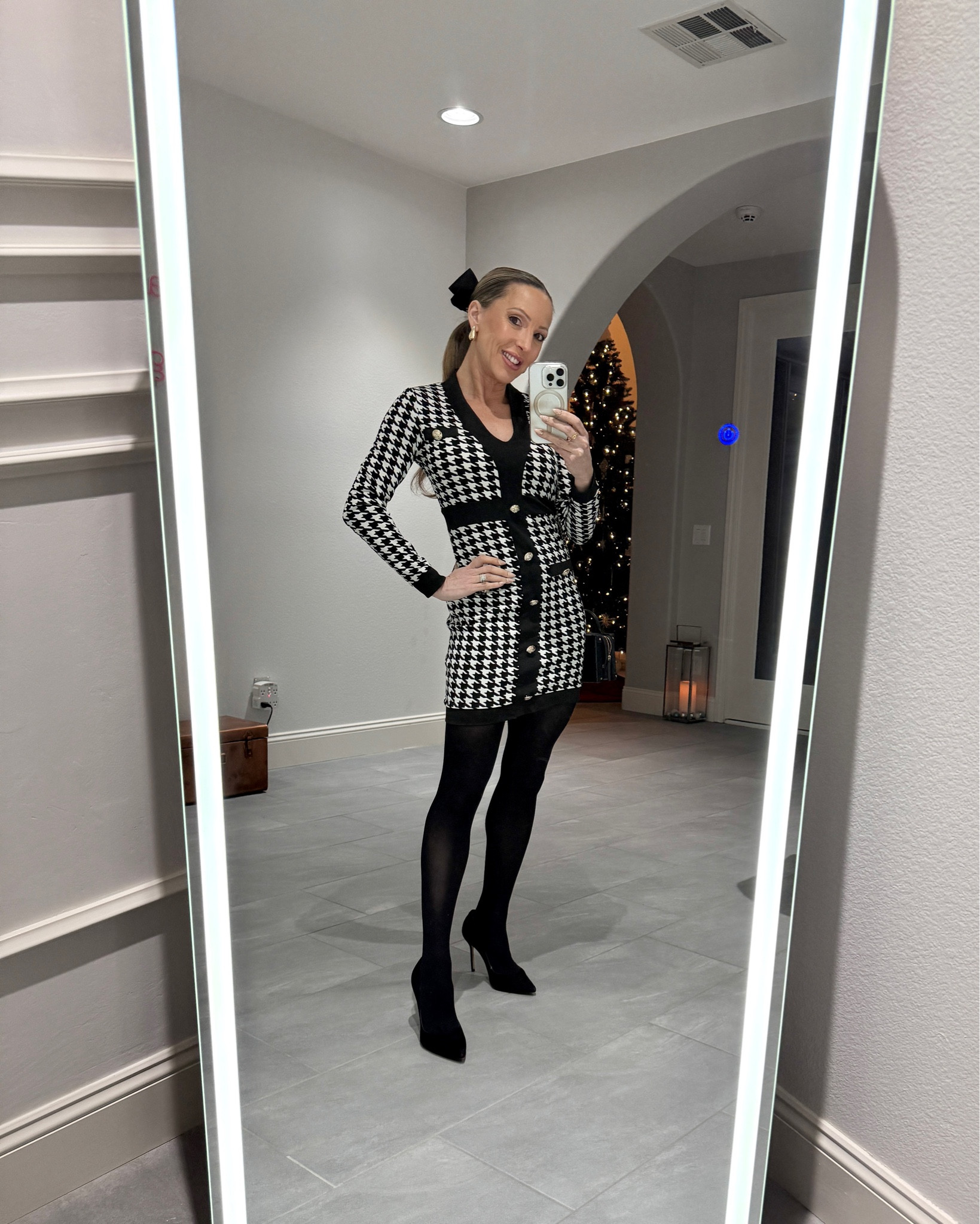 Classic winter outfit idea | OOTD houndstooth dress, black tights, black suede pumps, gold earrings, black Chanel vanity bag & black satin hair bow with crystal detailing.

#LTKHoliday #LTKSeasonal #LTKParties