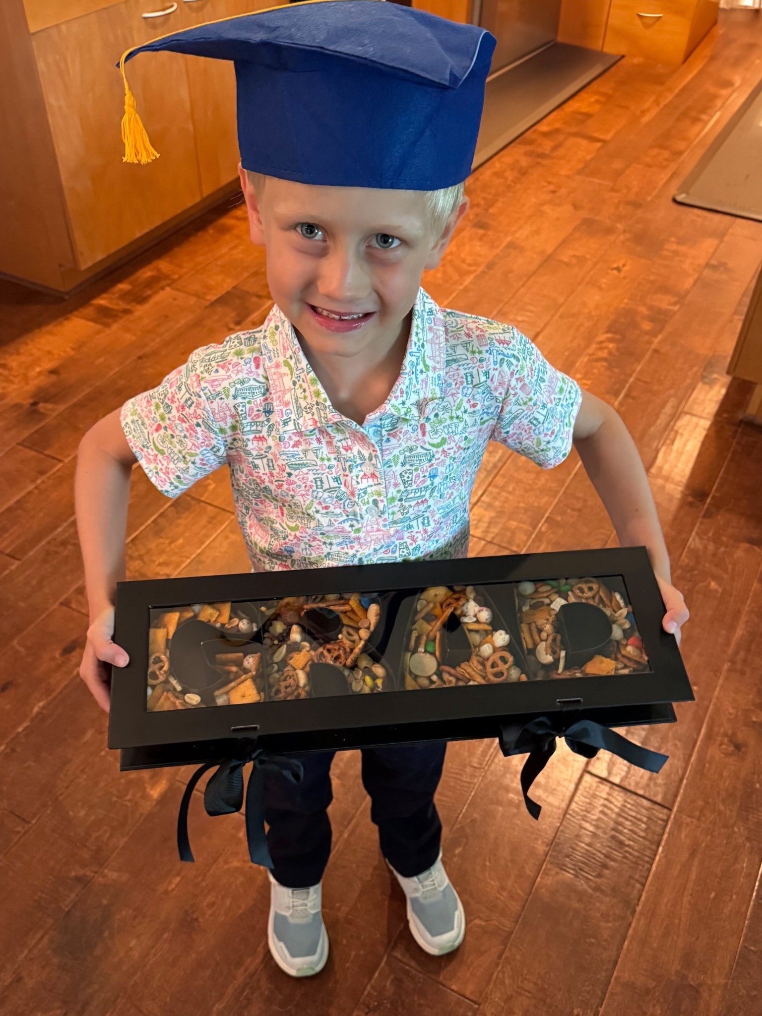Target: For the Win! Hugh loved his edible GRAD gift box. I filled it with his favorite trail mixes. What a great (and easy) way to be thoughtful! 

#LTKGiftGuide #LTKFindsUnder50 #LTKKids