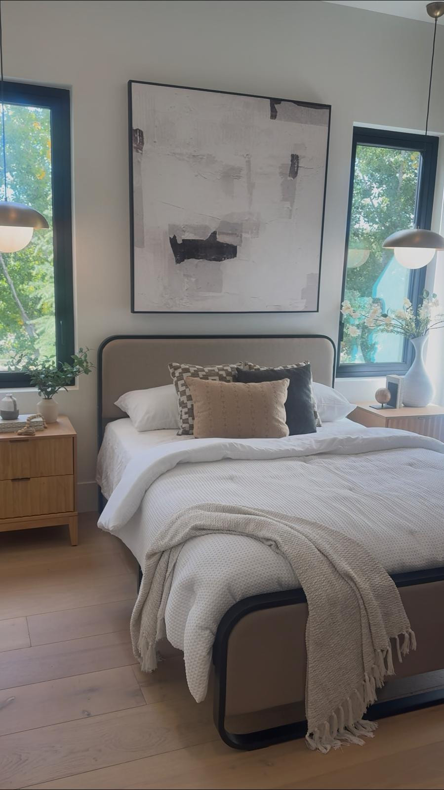I pulled together this bedroom with a mix of clean lines and soft texture to keep it feeling calm but still layered. The upholstered bed with the subtle frame detail, paired with warm wood nightstands and simple lighting, creates a balanced, modern look that works in everyday spaces.

I like keeping the bedding neutral and adding interest through texture and a few patterned pillows. Linking the pieces I used and similar options below if you’re building a warm, modern bedroom with a relaxed feel.
 @Wayfair 
@Target 
@Lulu and Georgia 
@walmart