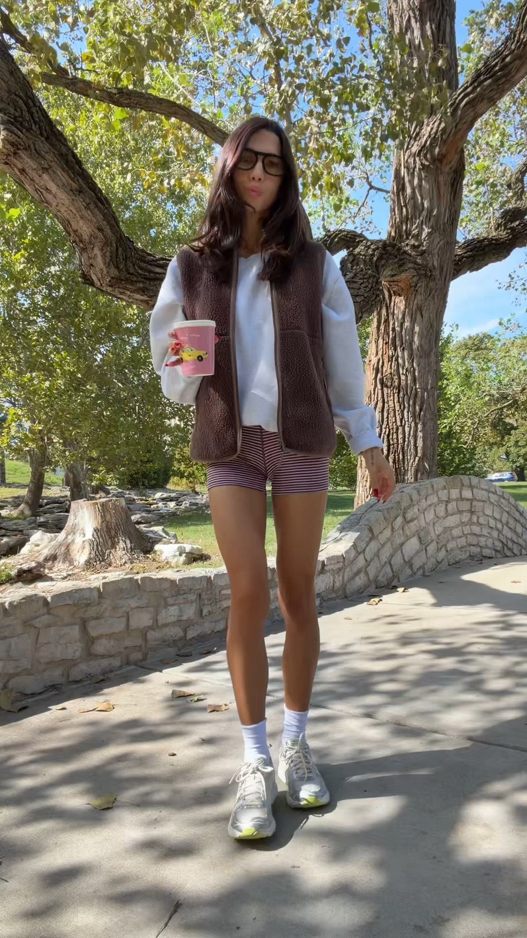 Fall walk outfit! S vest in rich mocha brown, XL sweatshirt and XS shorts @Shopbop @Aritzia

#LTKfitnessgoals #LTKootd #LTKmorningroutine