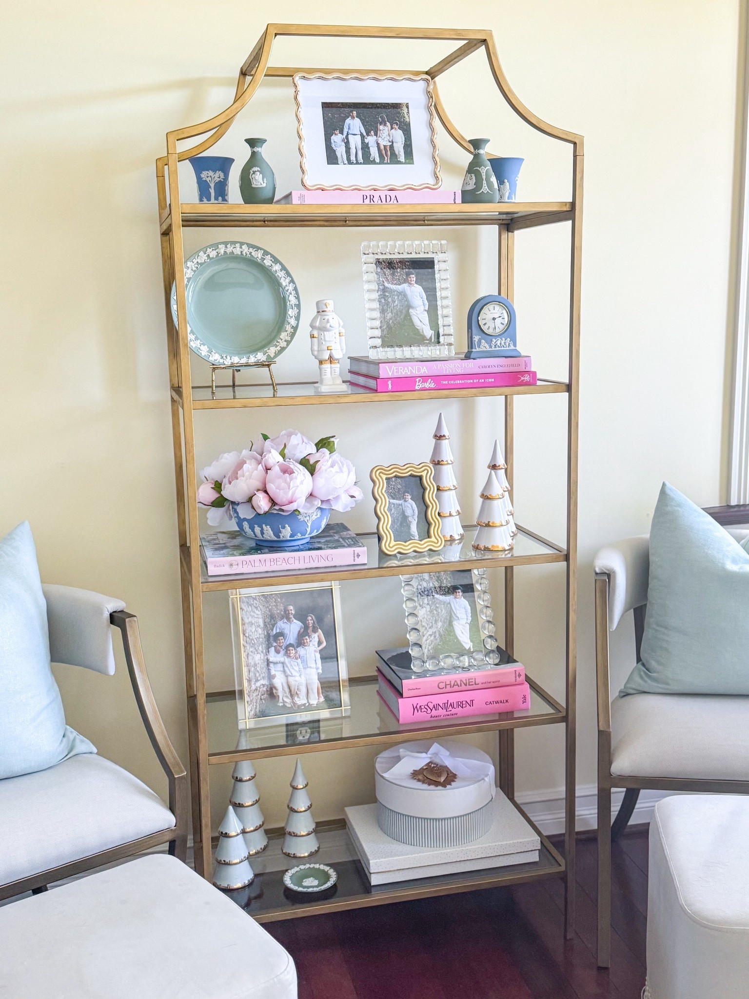 5 picture frames: 1 is Designer, the rest are Designer dupes. Which one is the designer? Can you tell the difference? I can’t! These TjMaxx crystal frames are incredible! I can’t believe they are under $20 🤯🤩

Christmas shelf styling, holiday decor, Christmas 2025, Wedgwood, pink coffee table books, ceramic Christmas trees, crystal frames, wavy gold frame, sacred heart, Milagro heart, target gift boxes, target finds, tjmaxx finds, look for less, etagere, Walmart finds 

#LTKFindsUnder100 #LTKHoliday #LTKHome