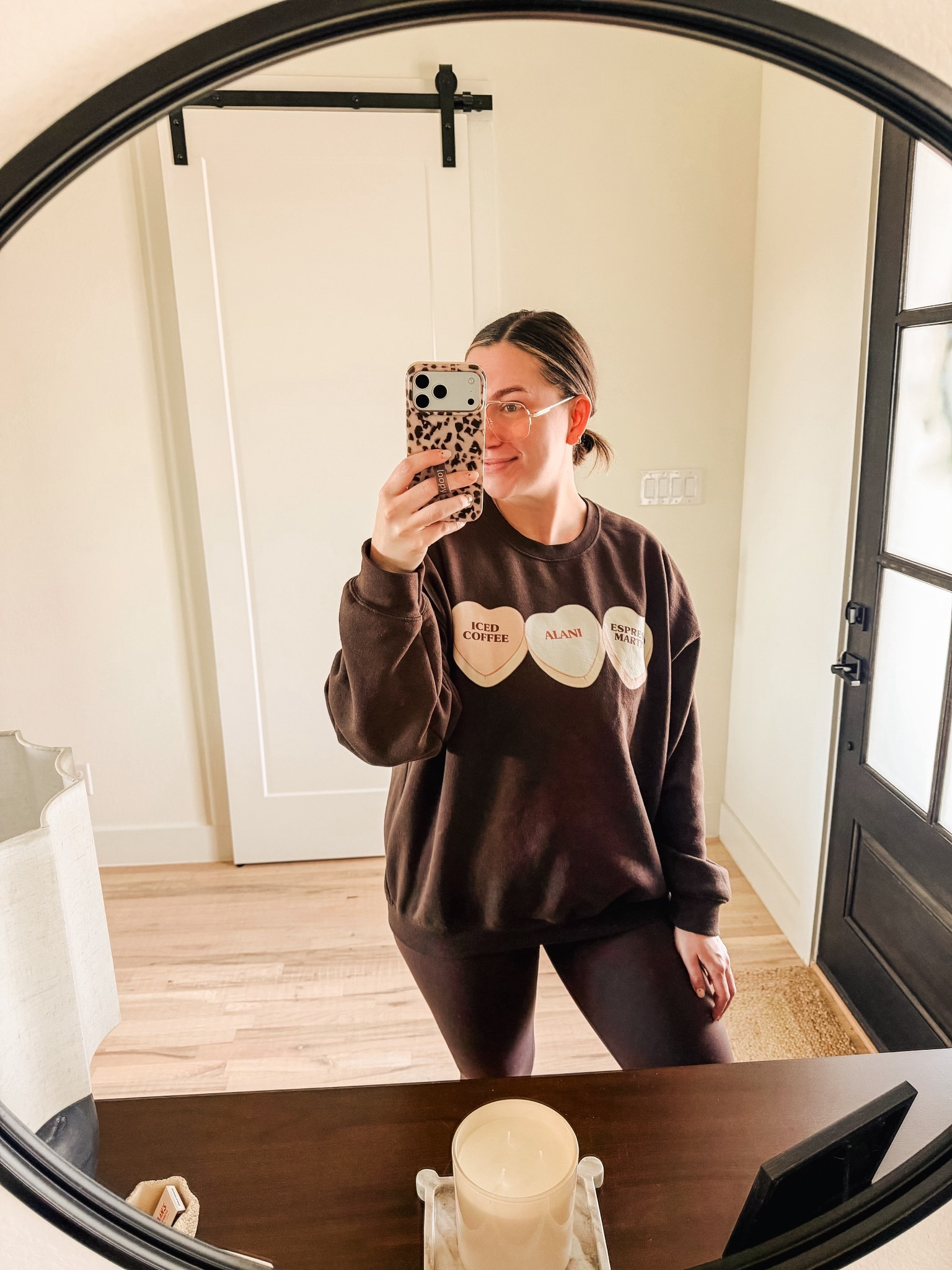 Glasses + leggings + phone case 🔗’d. I’ve also linked a really good dupe for my leggings. @thirtythreadstx made my sweatshirt. 🤎

#LTKootd #LTKMidsize #LTKValentine