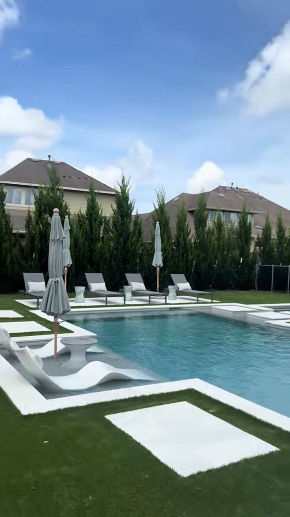 Full backyard tour including pool details, patio and pool furniture, and greenery. 

Outdoor chaise lounge chairs, wayfair, patio decor, pool design, ledge lounger, turf, outdoor fire pit, pool umbrella

#LTKHome