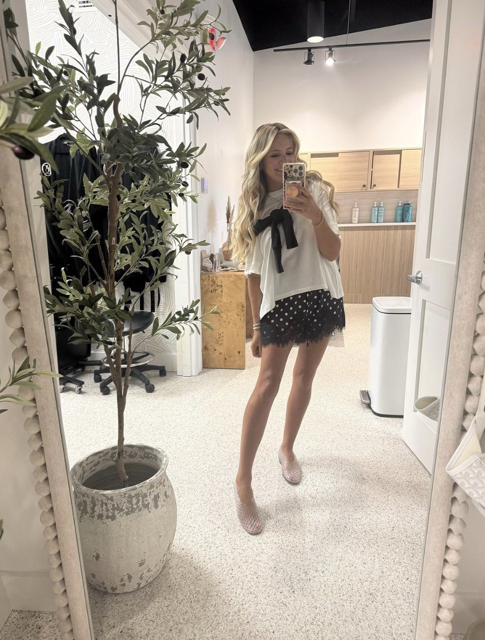 Effortlessly chic with a feminine twist 🤍 This white blouse, polka dot shorts, is the perfect summer outfit for work, brunch, or a night out. Shop the look on LTK! #SummerOutfit #SummerStyle #PolkaDotShorts #WhiteBlouse #BowTop #WorkwearStyle #BrunchOutfit #CasualChic #LTKFinds #LTKStyle 

 #LTKdayinmylife #LTKgrwm #LTKootd