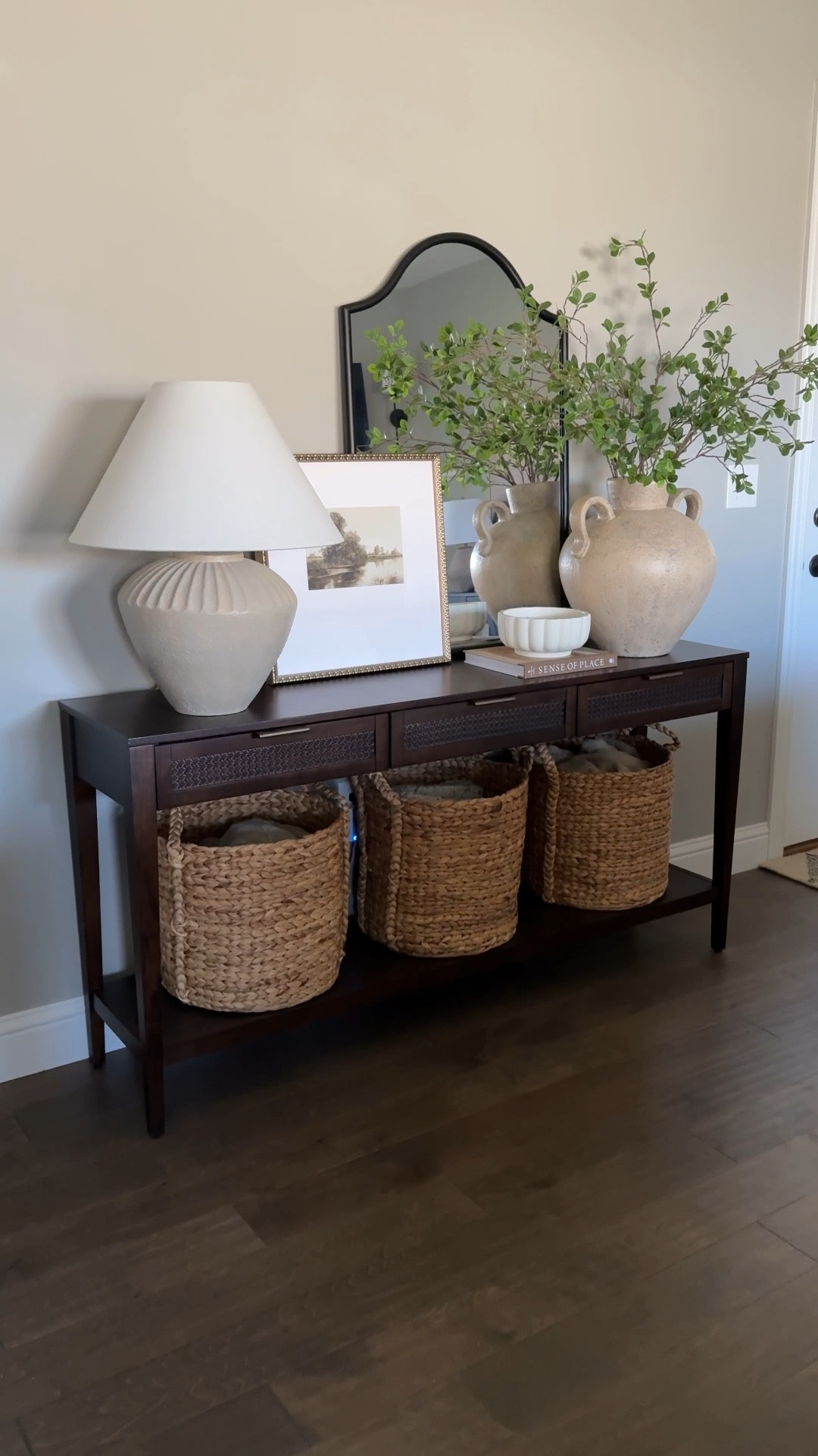 Did a little refresh to my entryway console table after moving my new vase over from the dining room. I love it here and think it makes a statement ☺️

#LTKWatchNow #LTKSeasonal #LTKHome