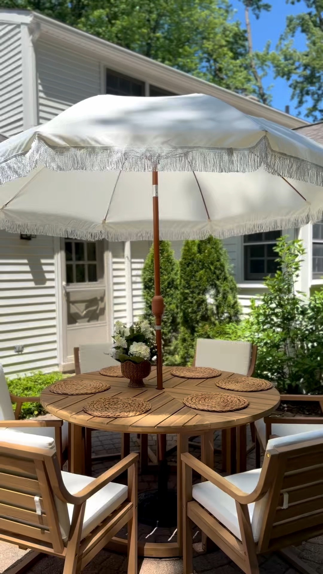 The perfect cream fringe patio umbrella for $65!

#LTKHome #LTKSeasonal #LTKSaleAlert