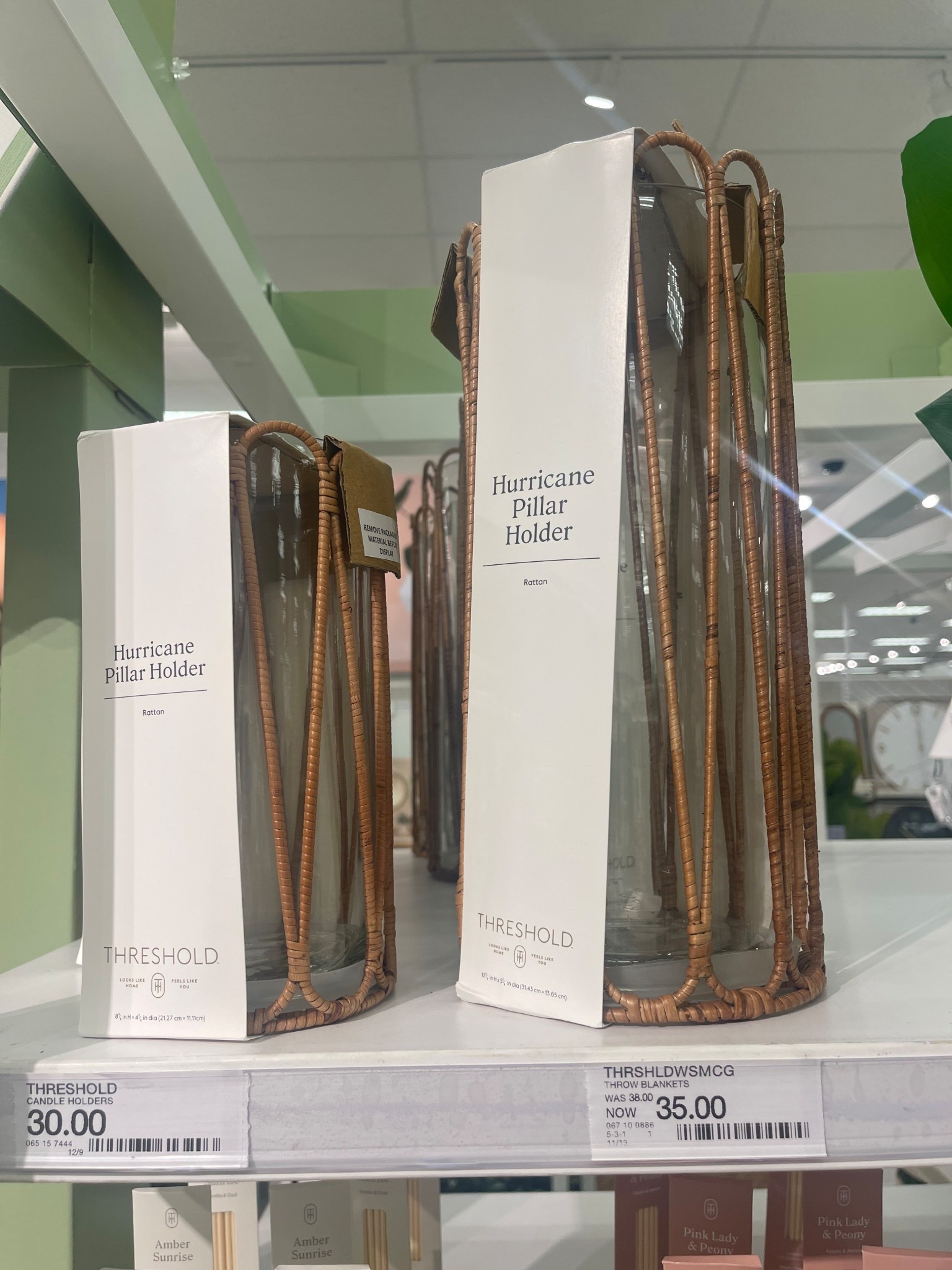 Rattan hurricane candle holders! Looks like Serena and Lily but on a budget! 
Outdoor decor, patio decor, candle holders, hurricanes 