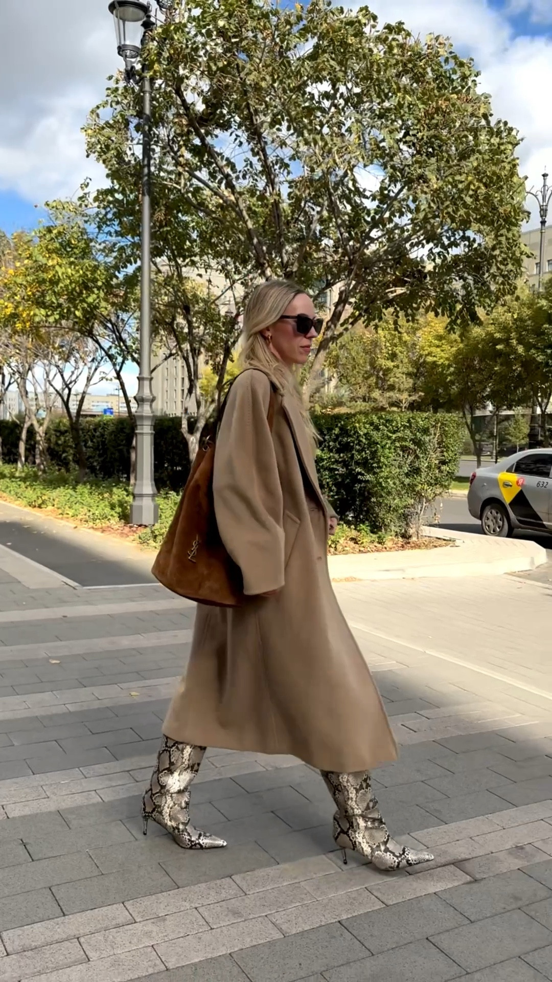 Spring outfit, camel coat, snakeskin boots, suede Saint Laurent bucket bag, minimal style 

#LTKOver40 #LTKSeasonal #LTKSaleAlert