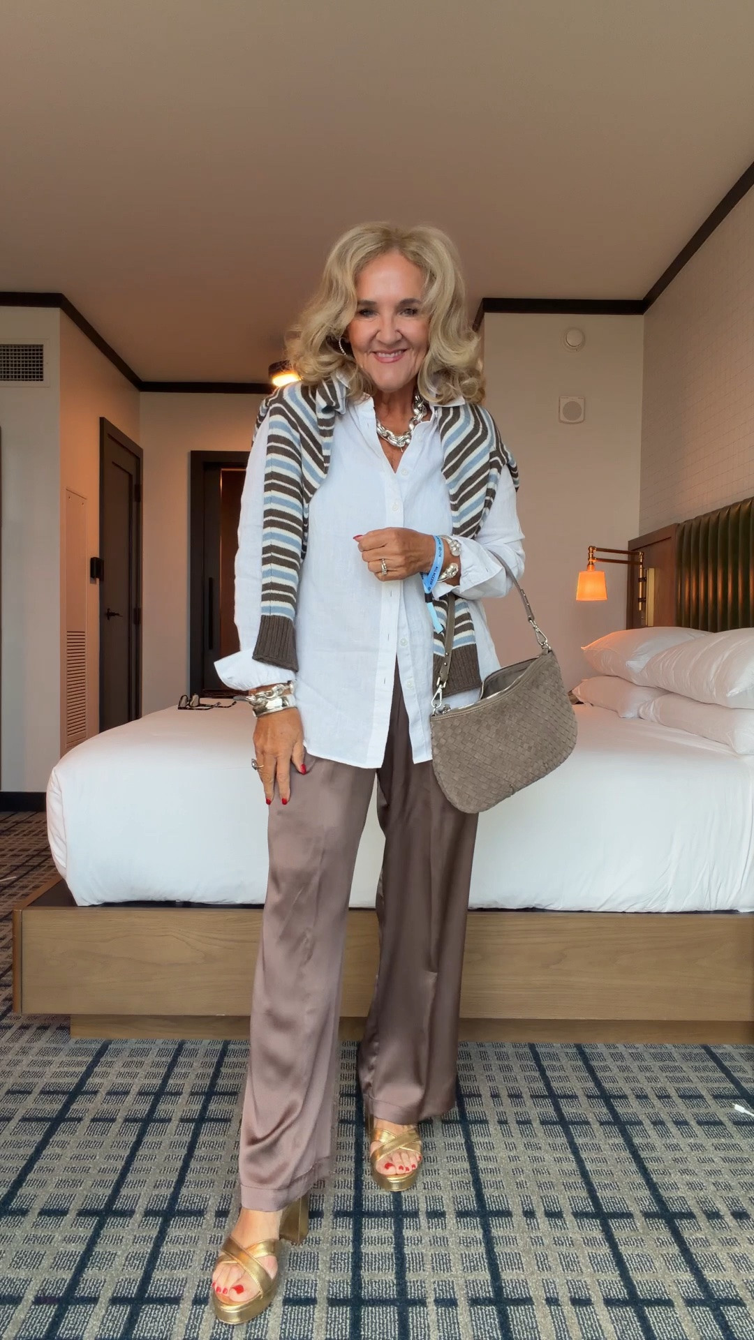 Silk pants size medium short 
Sized down in the platforms 
Linen blouse size medium 
Sweater medium this stripe is a limited edition so get it while it’s in stock because they will not be restocking.
New woven Crossbody in suede and it is beautiful.

#LTKOver40 #LTKCon #LTKPetite