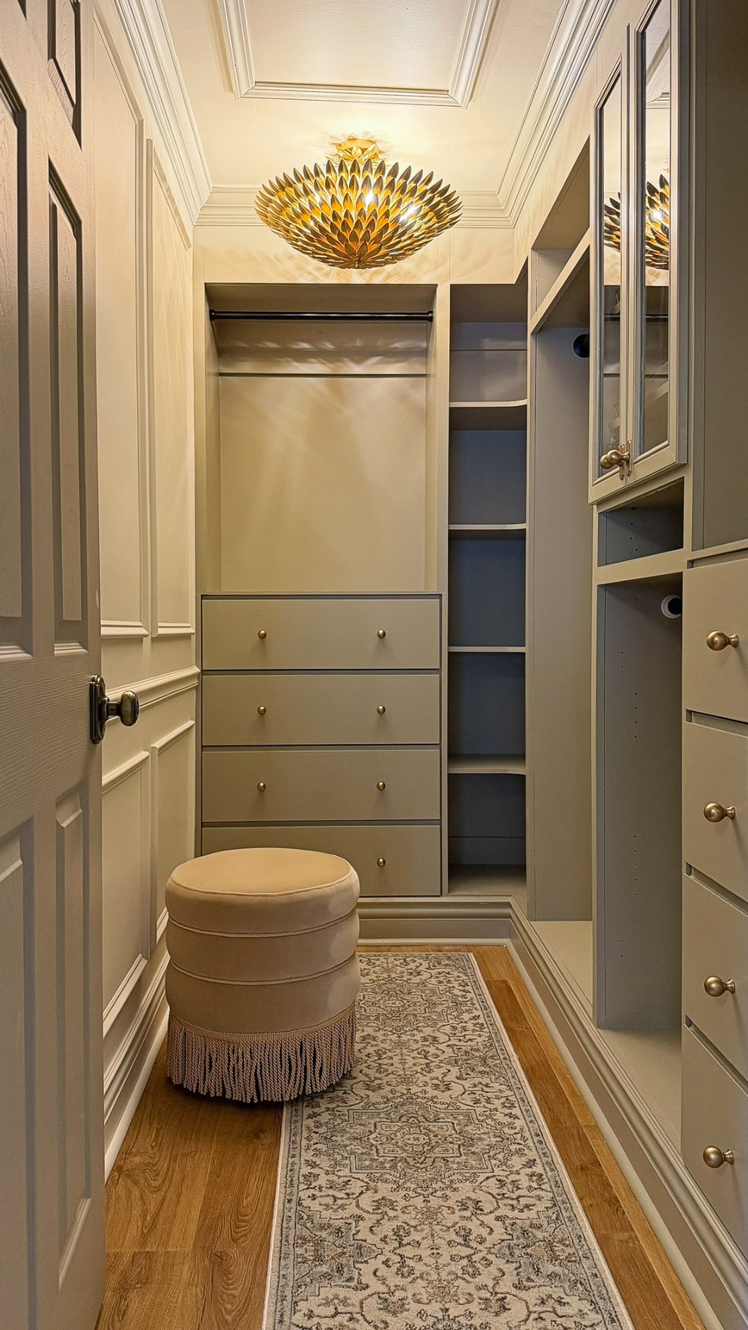 Our closet went from a messy and builder grade basic space to charming and very functional with lots of drawers, hanging space, a shoe cabinet with glass doors, and corner shelves that fully maximize the space!

#LTKHome #LTKgrwm #LTKdayinmylife