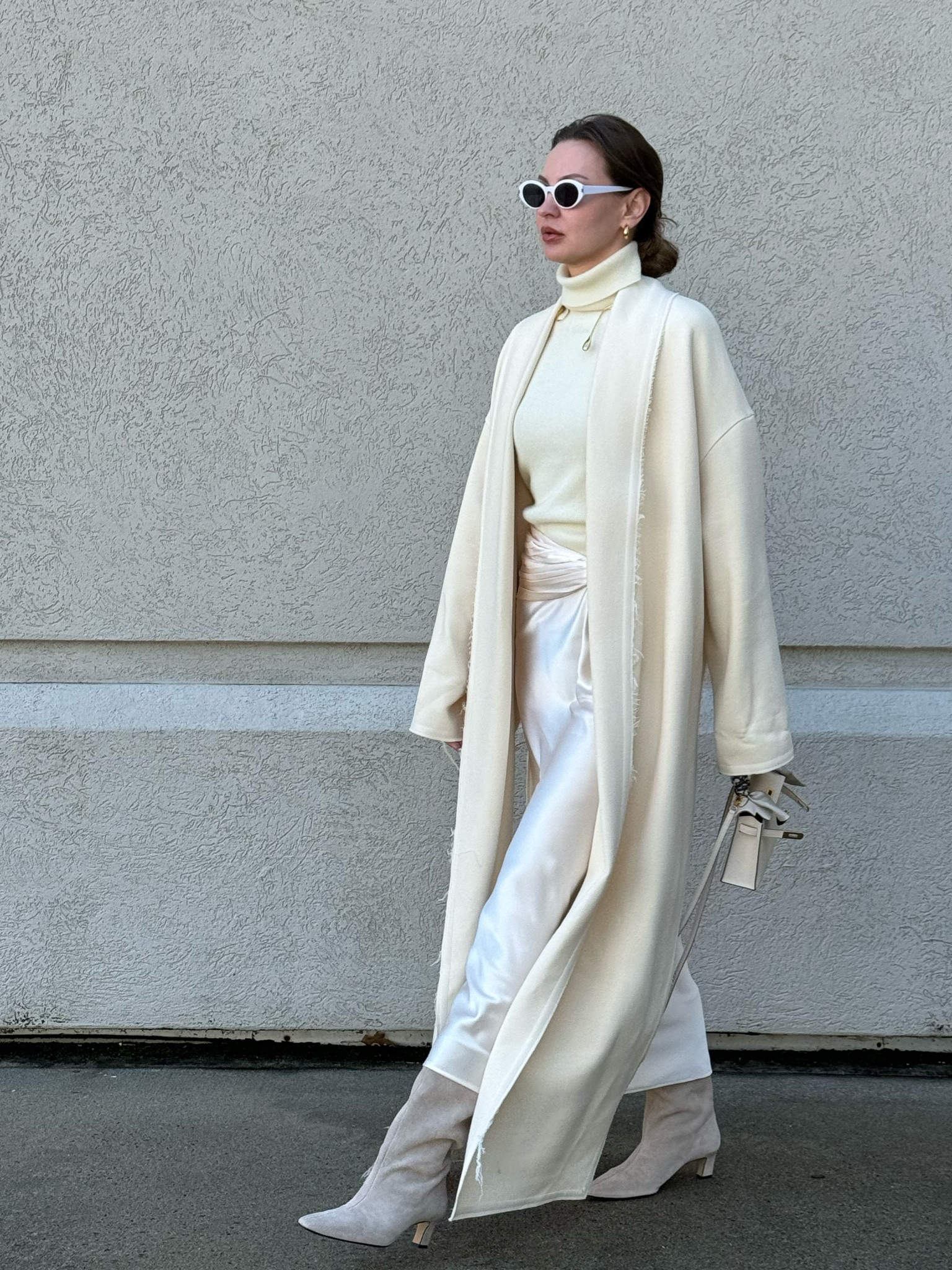 All white outfit with zara low heel  boots and white skirt that you can wear through spring-summer and fall