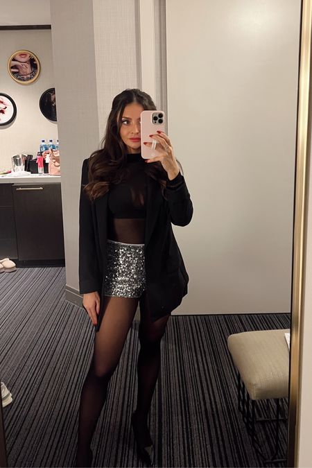 Holiday party outfit - amazon blazer (xxs), mesh bodysuit (xs), sequin shorts, black pumps 

New Year’s Eve outfit, Las Vegas outfit, sparkly outfit, sequin outfit, going out outfit, bachelorette party outfit 

#LTKparties #LTKHoliday #LTKfindsunder100